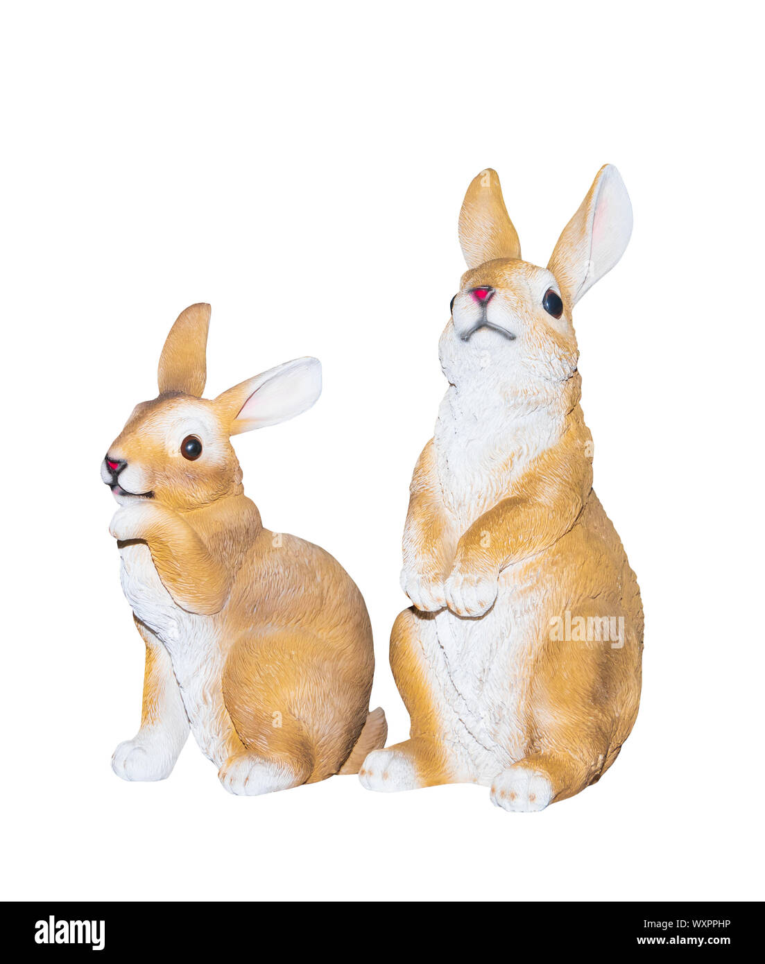 Two rabbits dolly toy is standing isolated on a white background Stock Photo