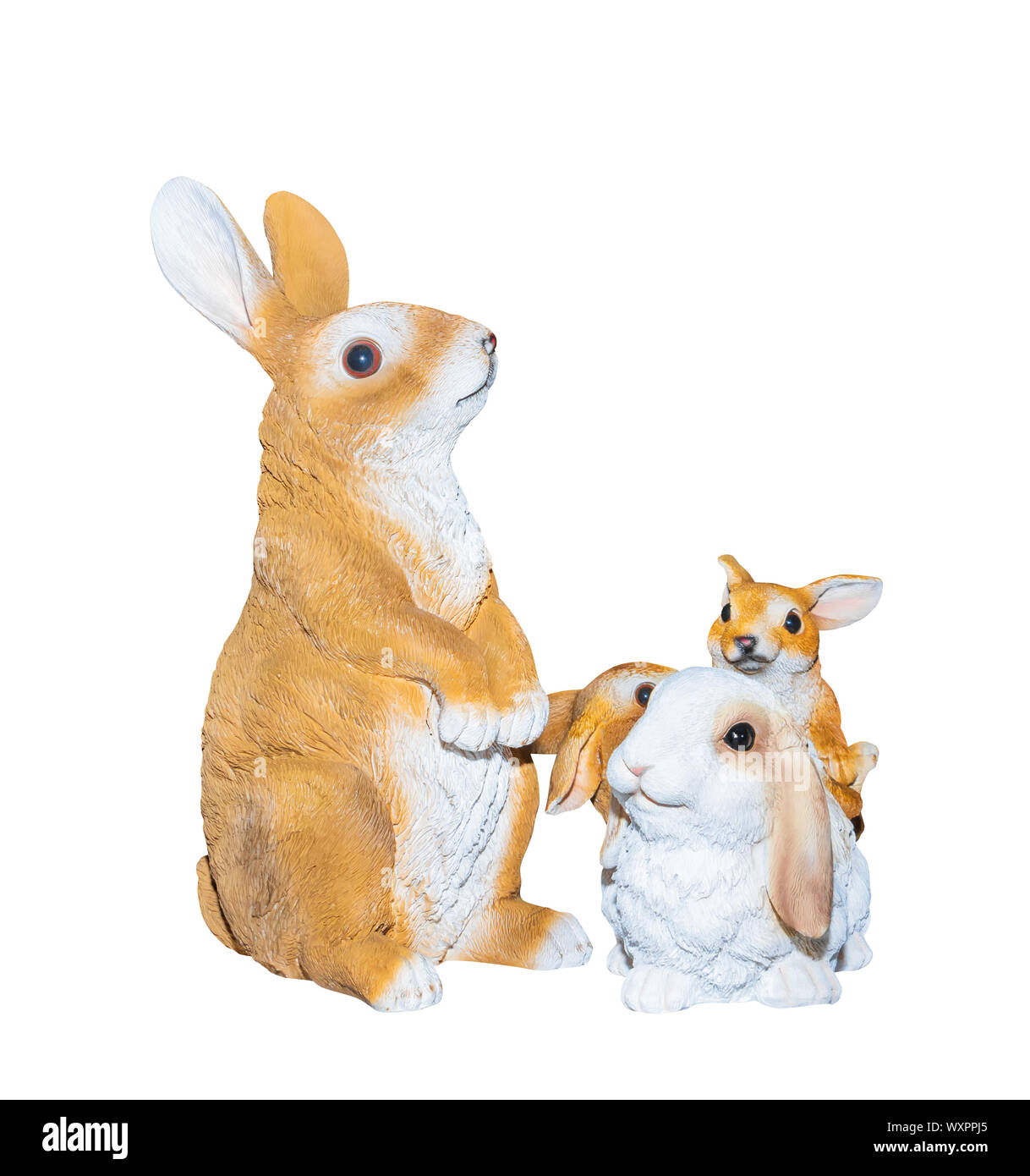 family rabbits dolly toy is standing isolated on a white background Stock Photo