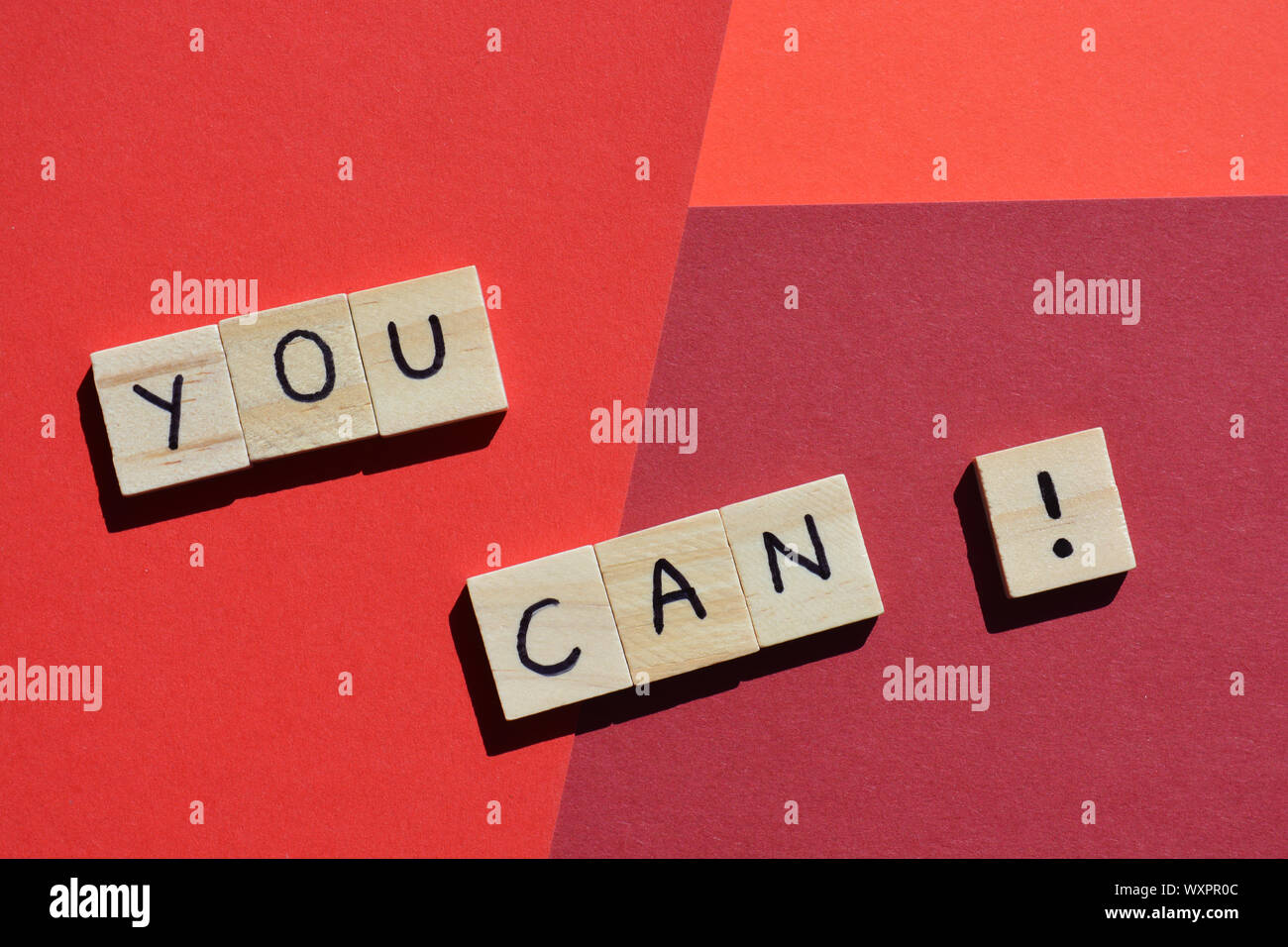 You Can, motivational words on a red background with copy space Stock Photo