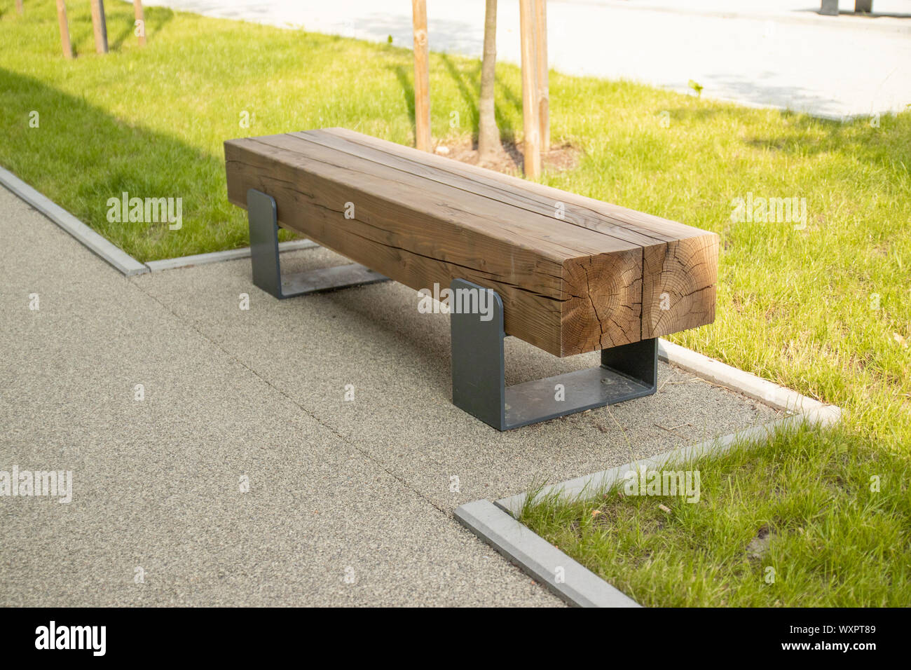 Street wooden bench in perspective, bench in the park Stock Photo - Alamy