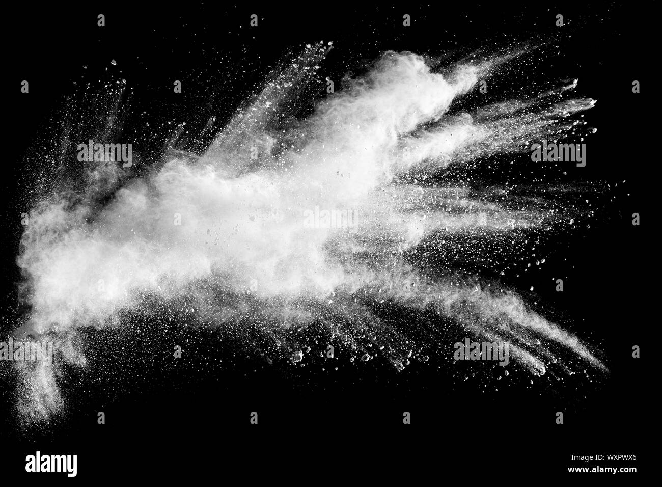 White powder explosion clouds.Freeze motion of white dust particles on