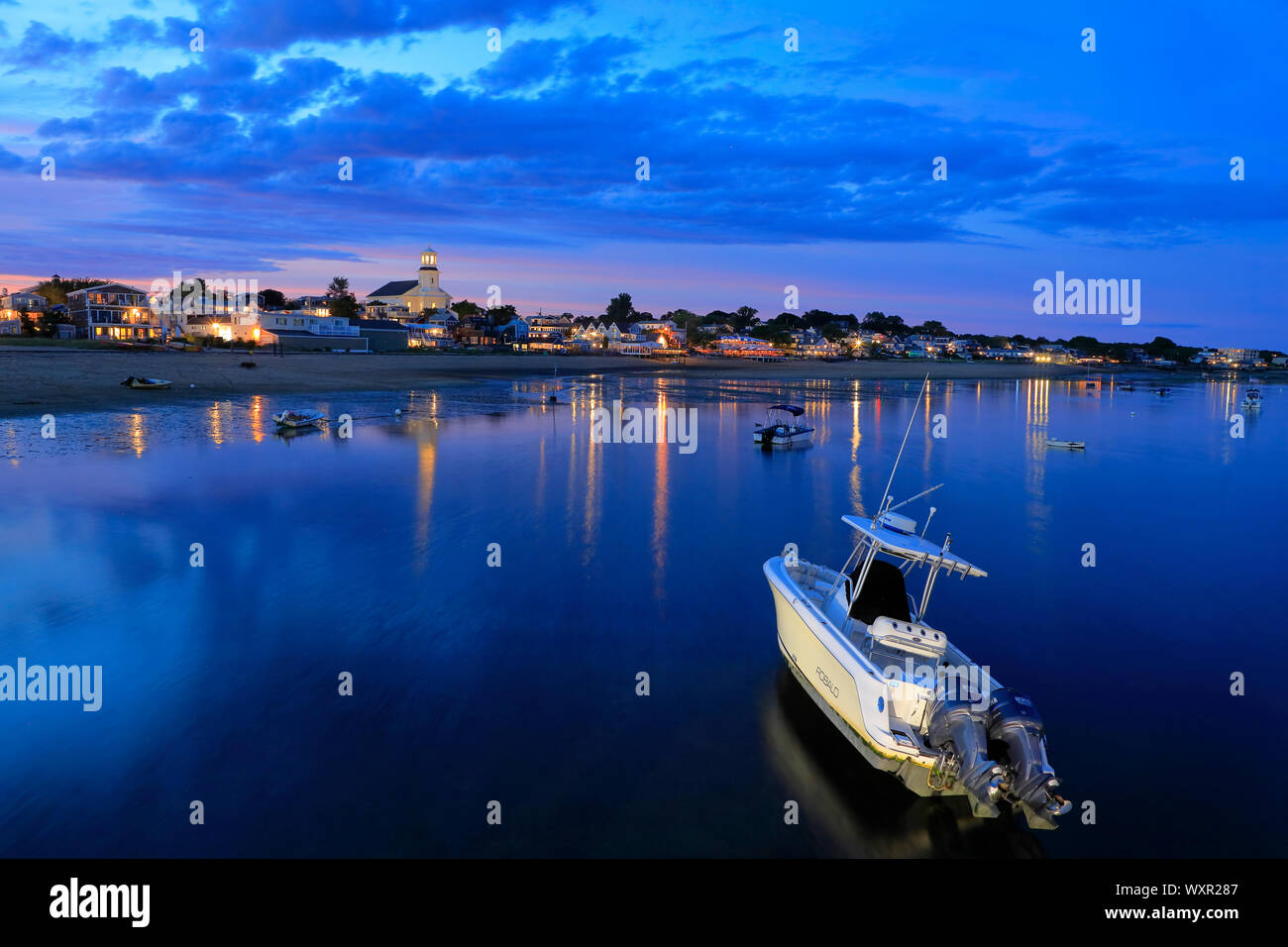 Waterfront of Provincetown during low tide and dusk with Public Library