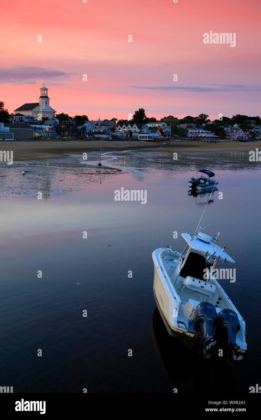 Provincetown beach during low tide and evening hour with town Public