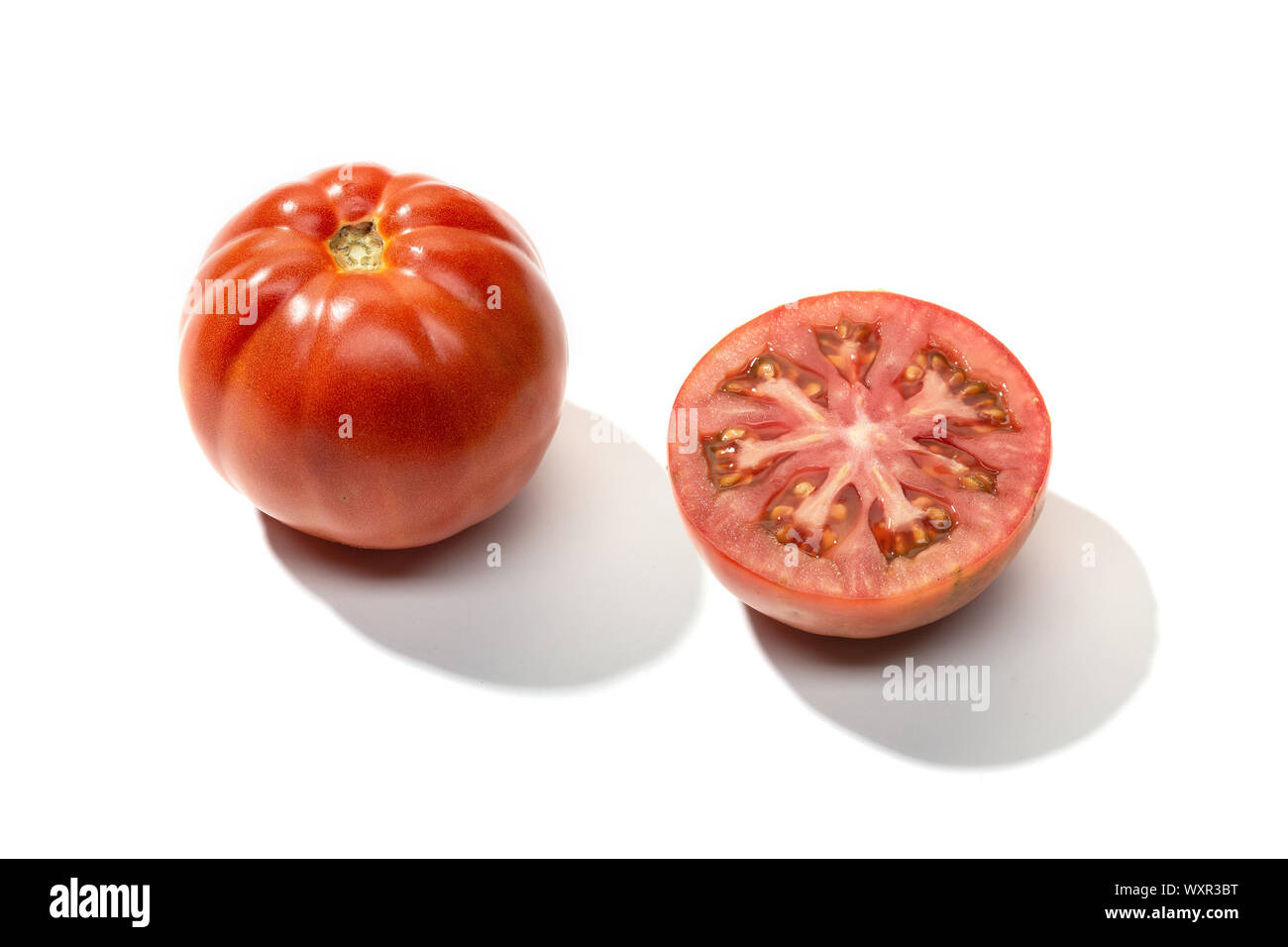 Fresh red tomato isolated on white background Stock Photo - Alamy