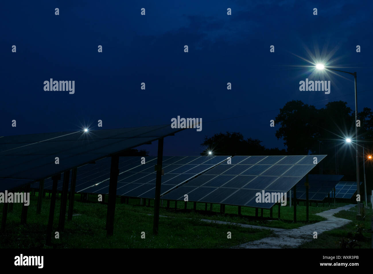 Solar power plant at night. Stock Photo