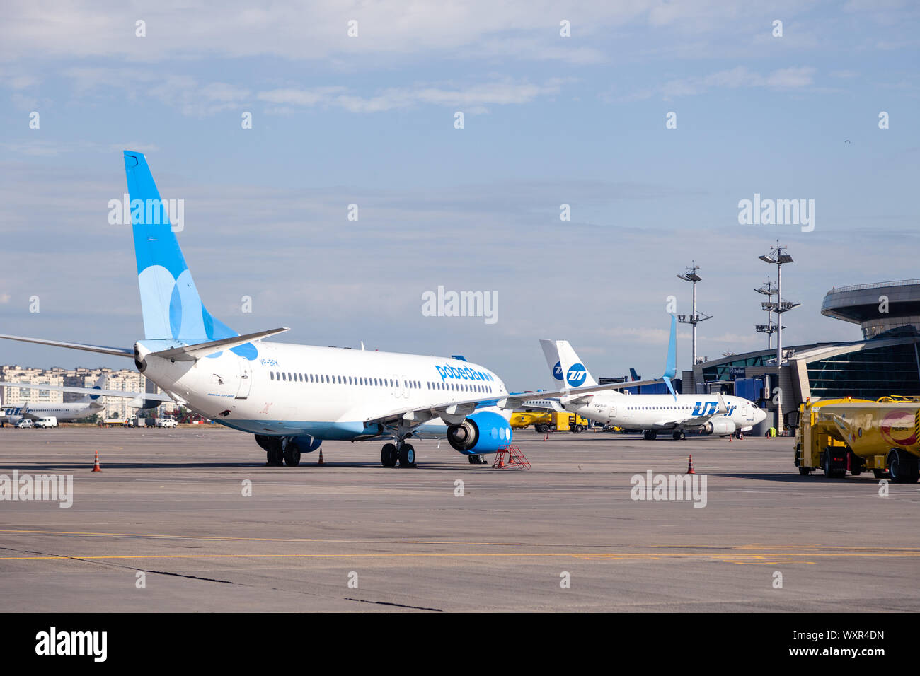 Russia Moscow 2019-06-17 Boeing 737 Pobeda Airlines russian company low cost price arrived to airport, standing on airplane parking, landing strip Stock Photo