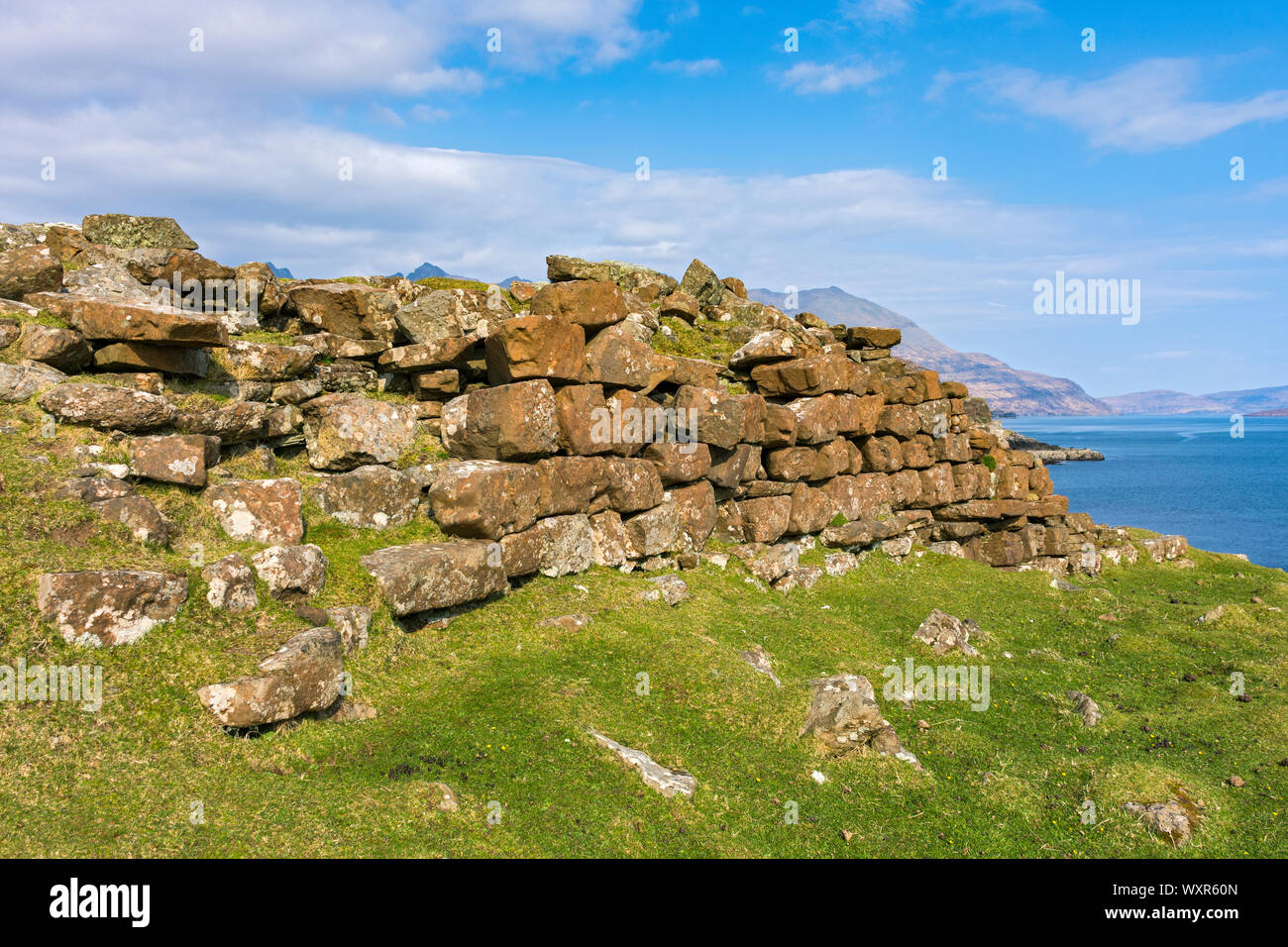 The dun or hill fort at Rubha an Dùnain, Minginish, Isle of Skye, Scotland, UK Stock Photo