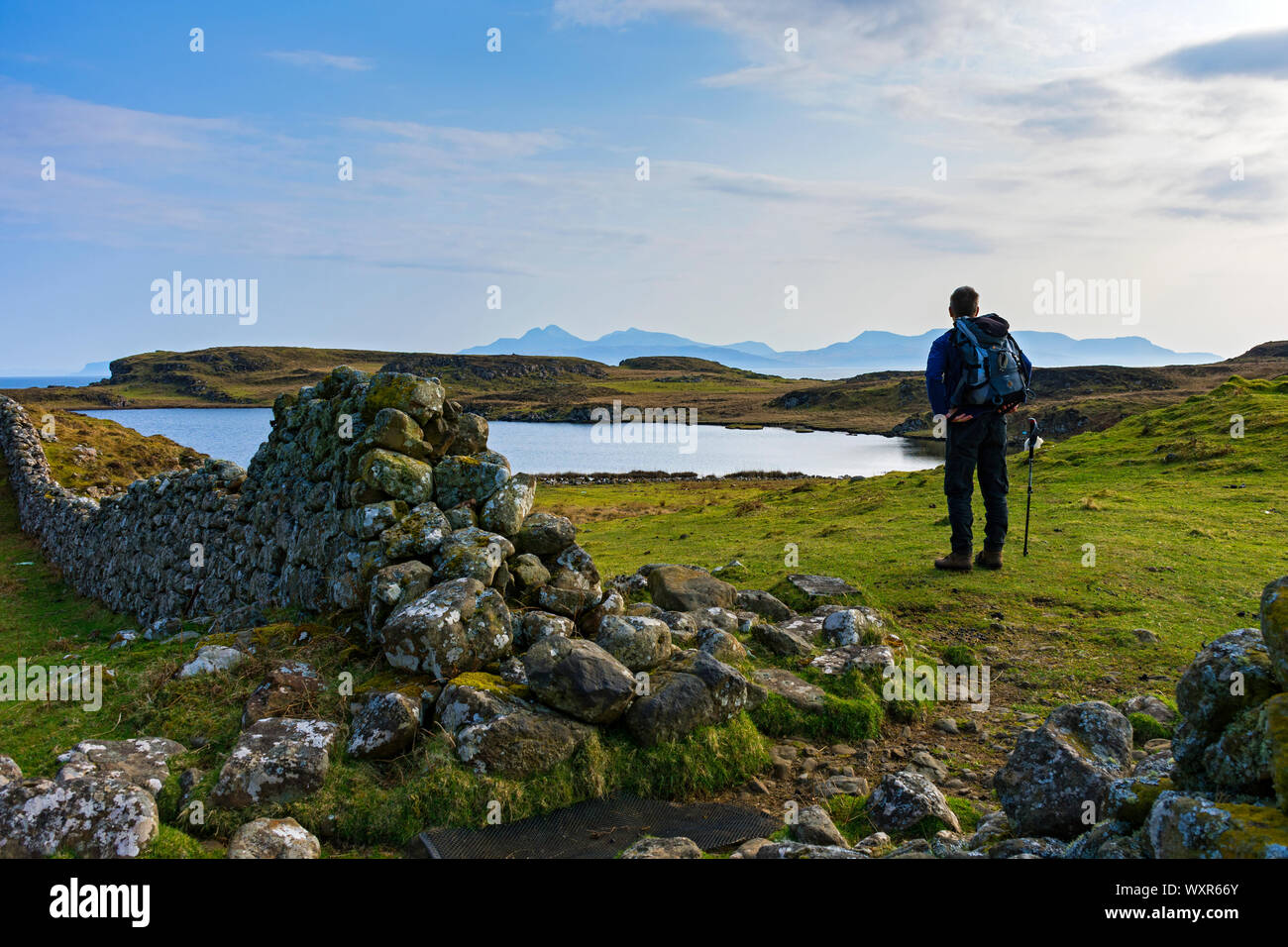The Isle of Rum over Loch na h-Airde on the Rubha an Dùnain peninsula, Minginish, Isle of Skye, Scotland, UK Stock Photo