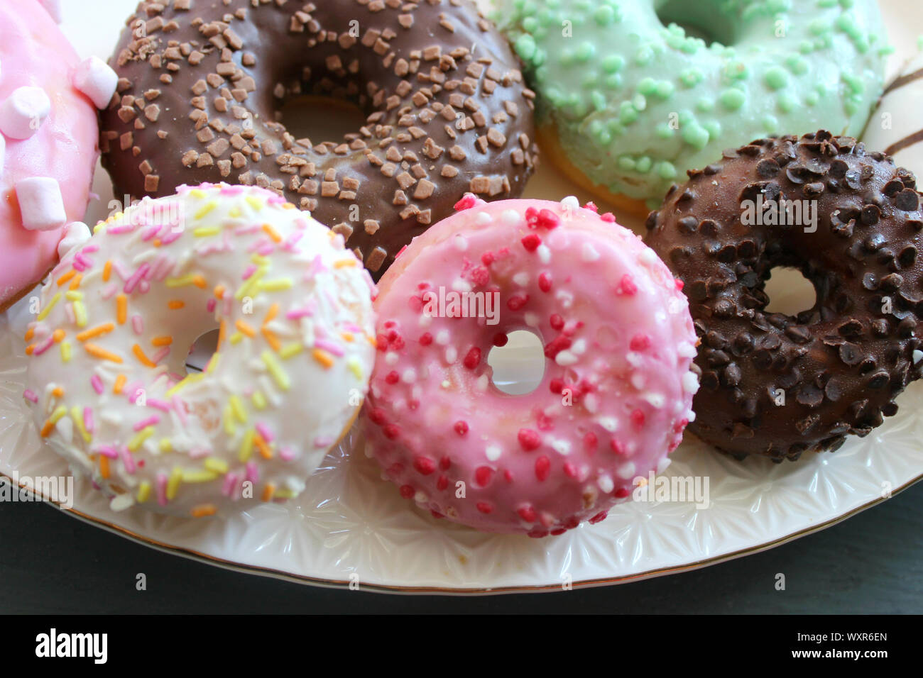 Assorted colorful donuts close-up. Photos of different donuts Stock ...