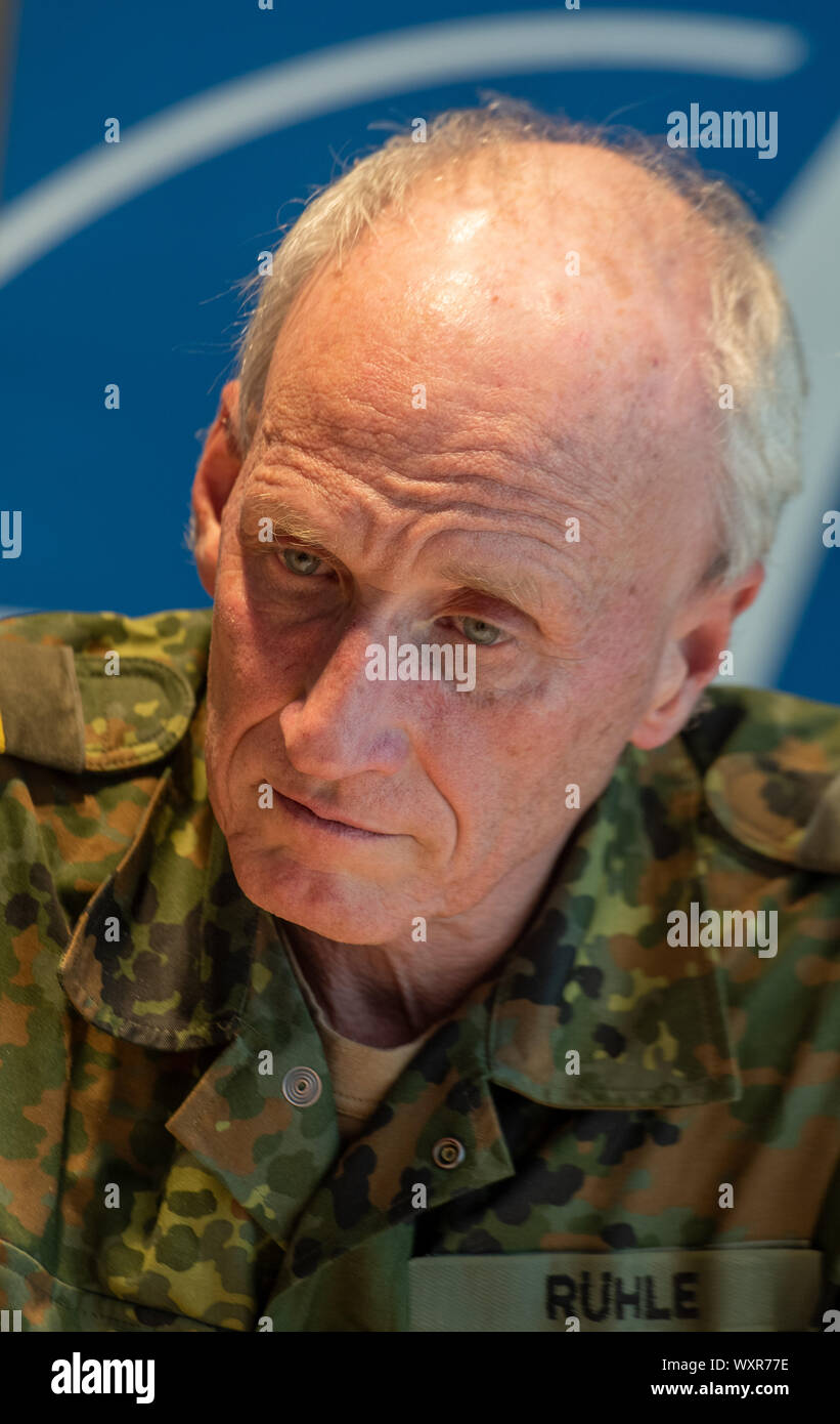 Ulm, Germany. 17th Sep, 2019. The Deputy Inspector General of the Bundeswehr, Vice Admiral Joachim Rühle, sits in front of the Nato logo at a press conference. At a two-day meeting, representatives of the NATO States discussed the establishment of the NATO Joint Support and Enabling Command (JSEC). Credit: Stefan Puchner/dpa/Alamy Live News Stock Photo