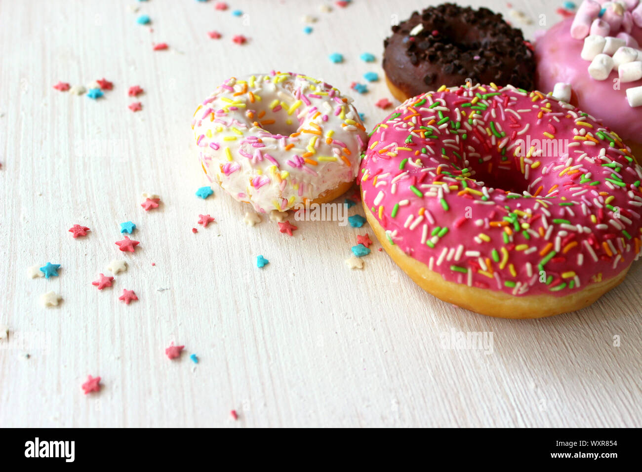 Assorted colorful donuts close-up. Photos of different donuts Stock ...