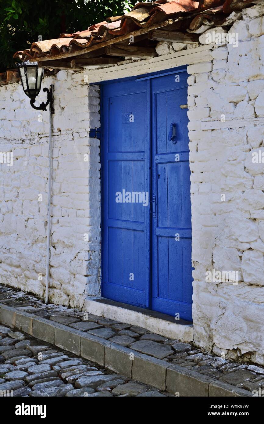Blue door in Elbasan, Albania Stock Photo