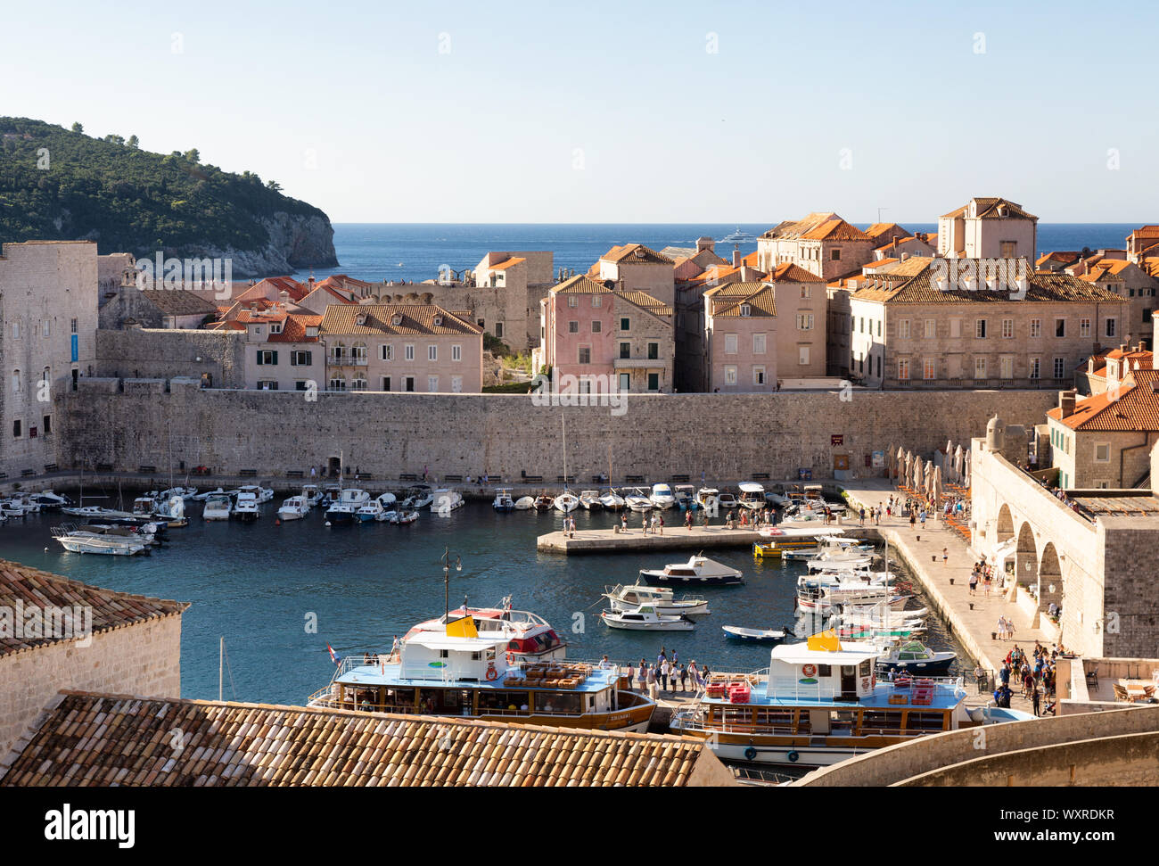 Dubrovnik travel; Dubrovnik old town harbour view in summer, Dubrovnik Croatia Europe Stock Photo