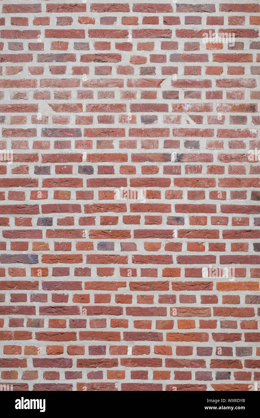 Old brick walling background/template. Empty brick wall for posters, advertising, signs, plate, etc. Stock Photo