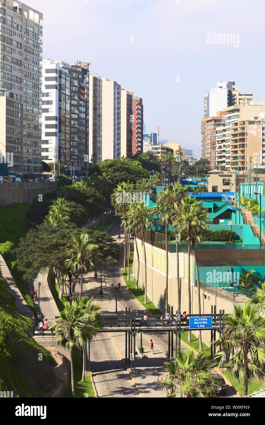 LIMA, PERU - FEBRUARY 20, 2012: The street Bajada Balta with the Club Tennis Las Terrazas and residential buildings in Miraflores, Lima, Peru Stock Photo