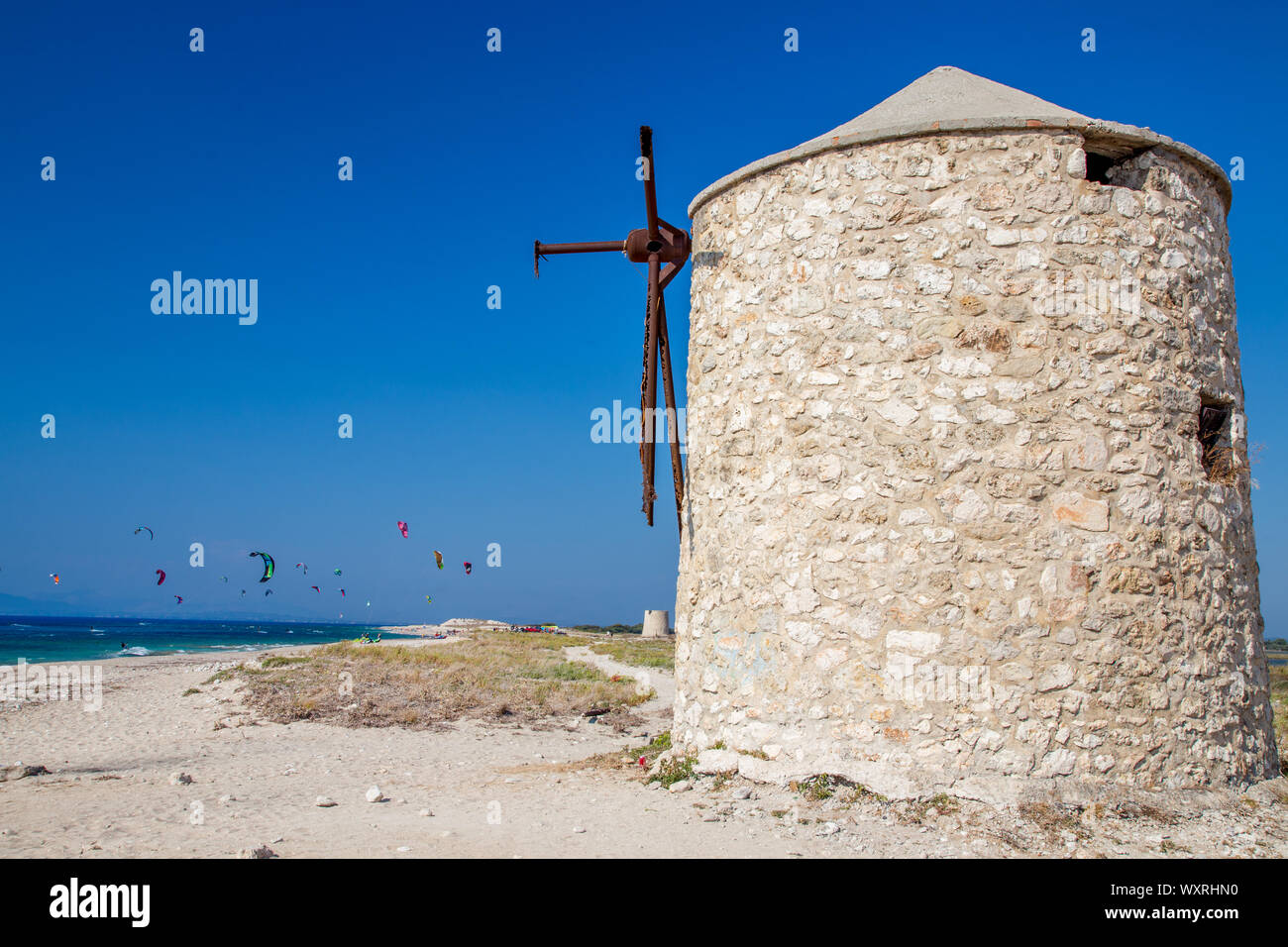 Windmill ruins on Agios Ioannis beach, Lefkada / Lefkas Island, Greece Stock Photo