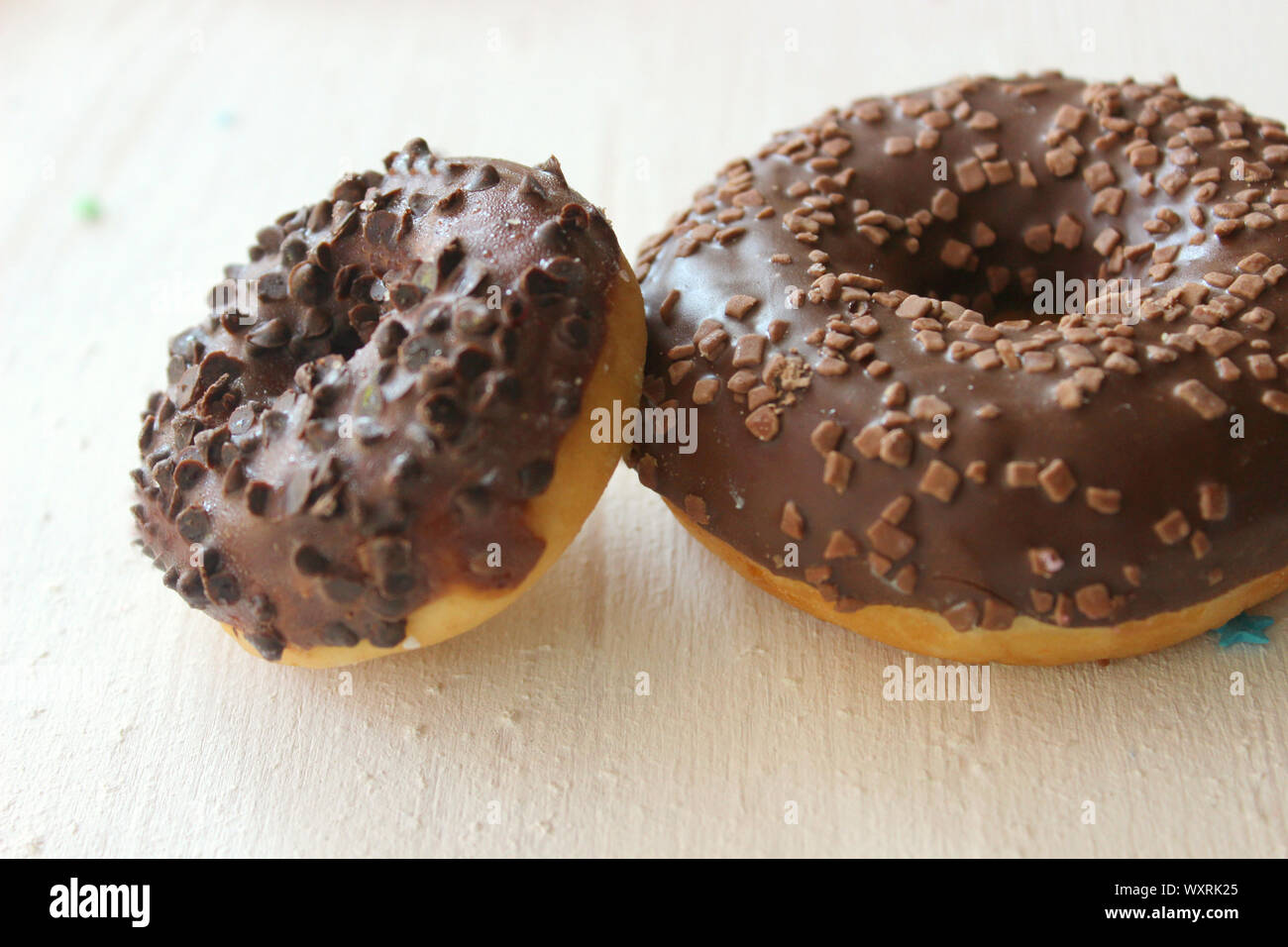 Chocolate donuts in glaze on a white background Stock Photo - Alamy