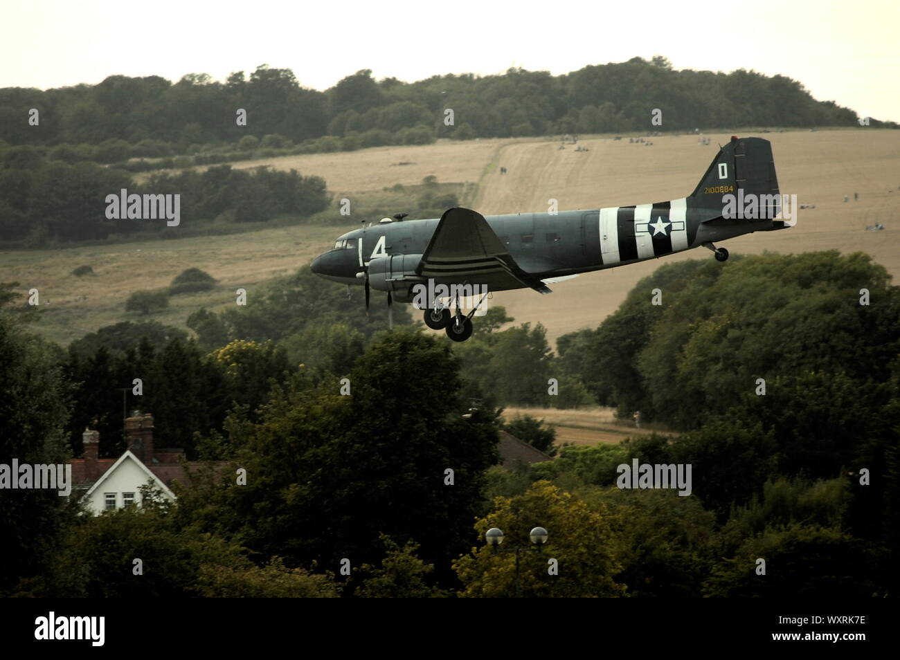 AJAXNETPHOTO. 2ND SEPTEMBER, 2013. SHOREHAM, ENGLAND. - LAST OF THE FEW -  ONE OF THE FEW REMAINING AIRWORTHY DOUGLAS SKYTRAIN C-47S LANDING AT SHOREHAM AIRPORT DURING AIR-SHOW.  PHOTO:JONATHAN EASTLAND/AJAX  REF D1130109 592 Stock Photo