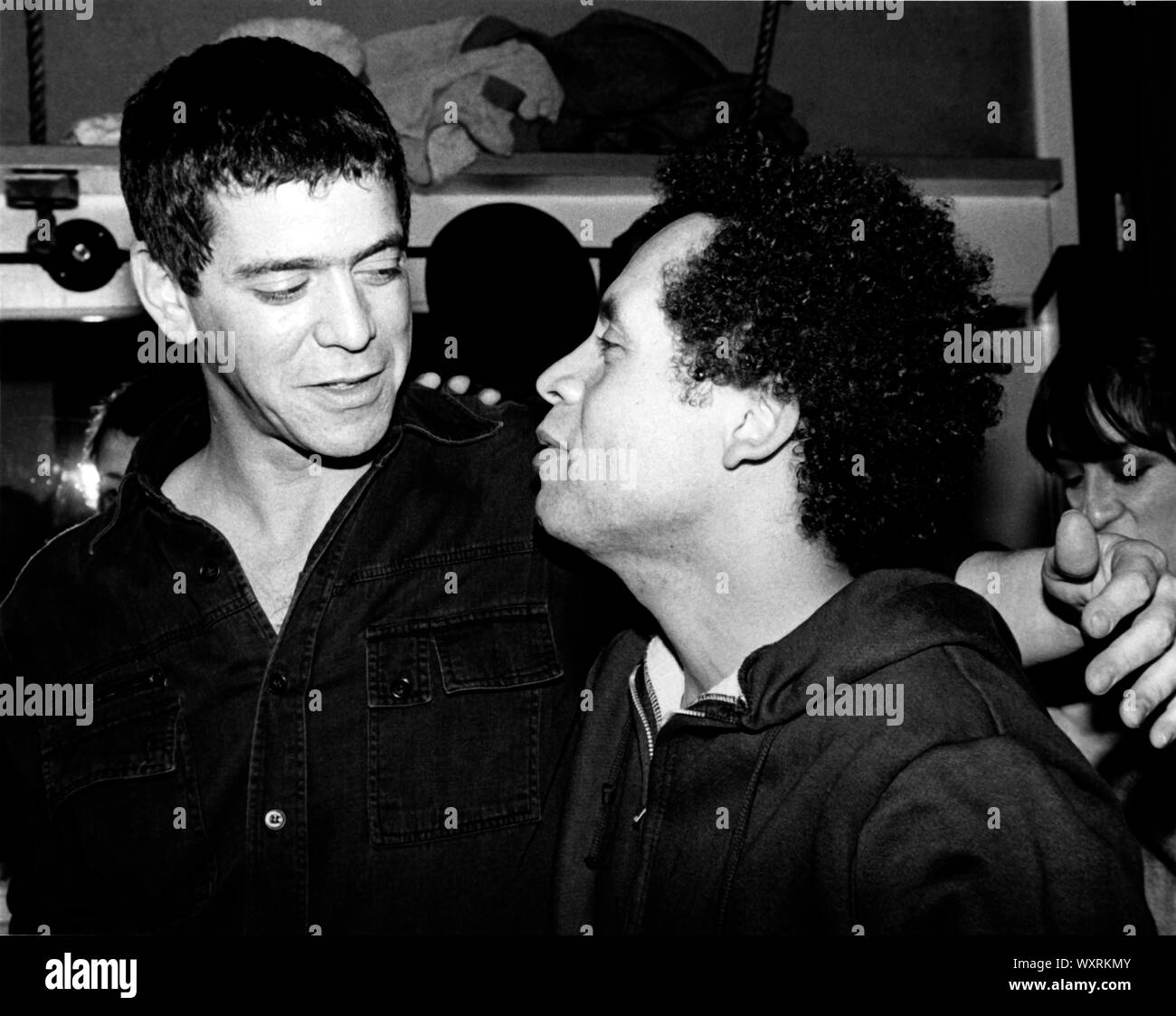 Lou Reed visits Garland Jeffreys backstage in November, 1979. Jeffreys had just given a concert at the Bottom Line. Stock Photo