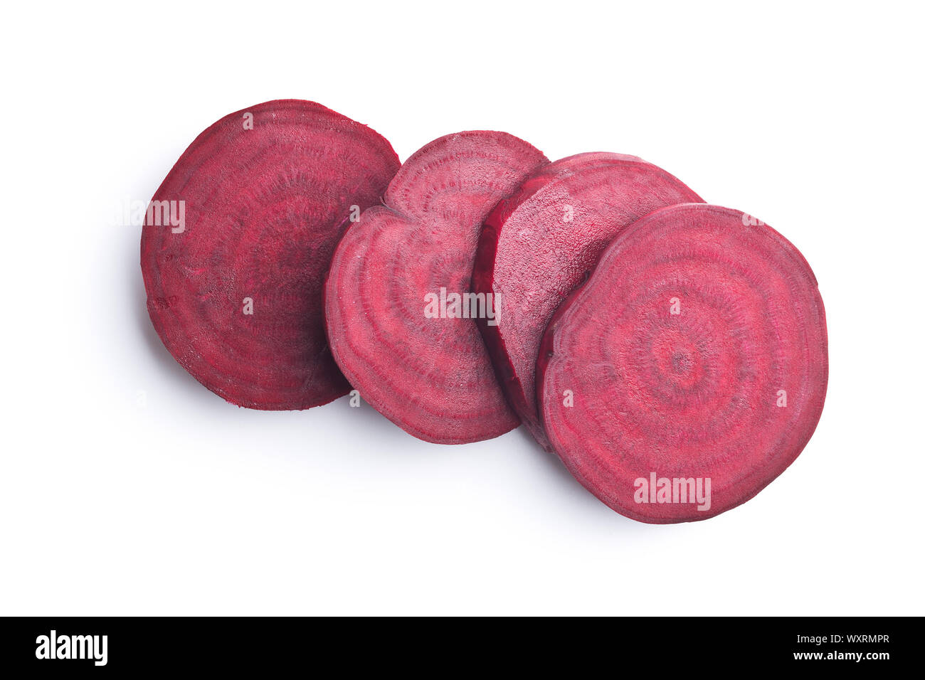 Tasty raw beetroot. Sliced beetroot isolated on white background. Stock Photo