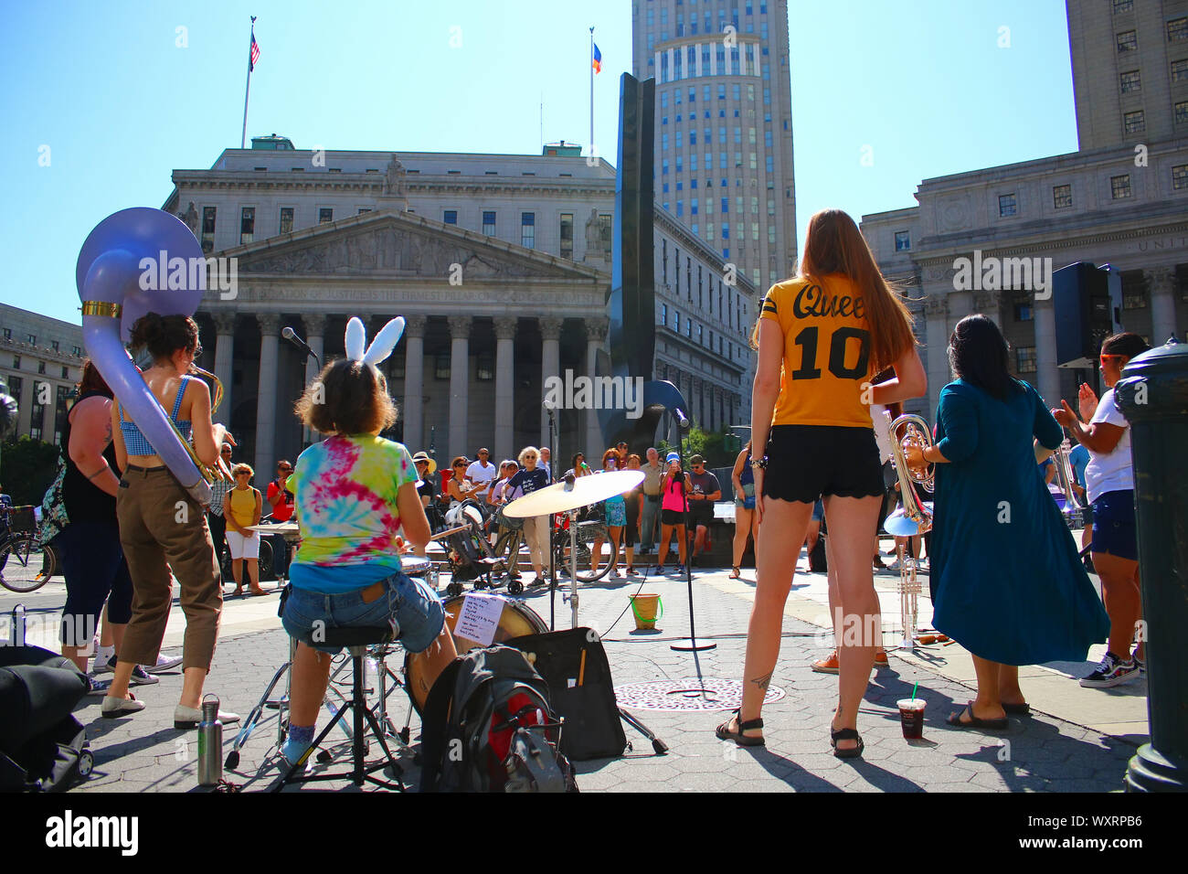 Allfemale Brass Queens band performs at Foley Square to a crowd of