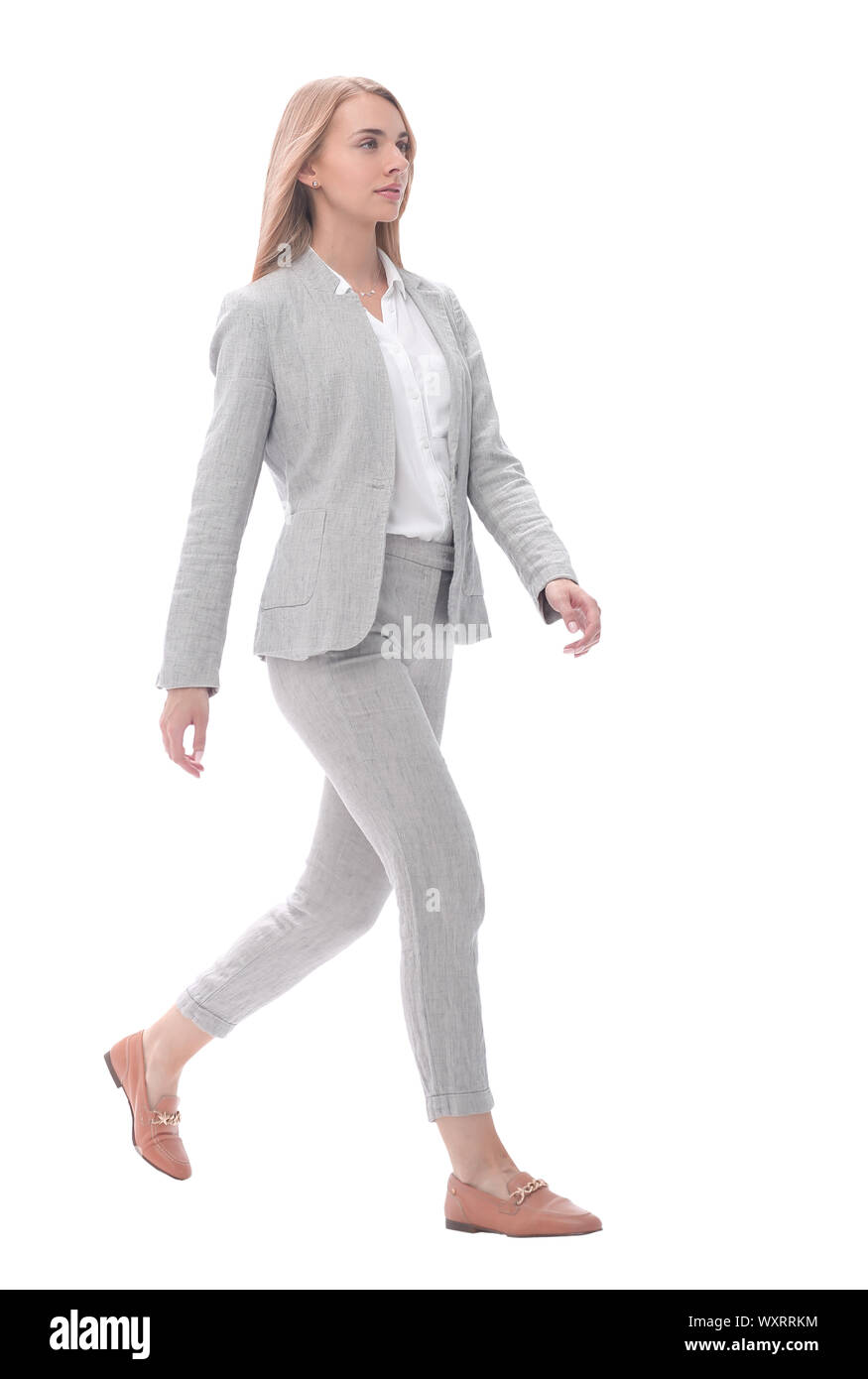 serious young businesswoman stepping forward.isolated on white Stock ...