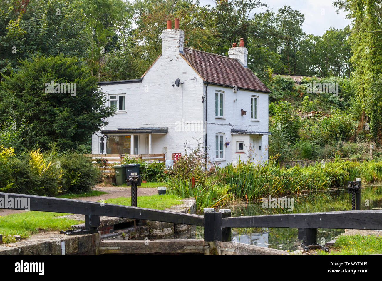The old lock keeper's cottage and pound lock on the banks of the