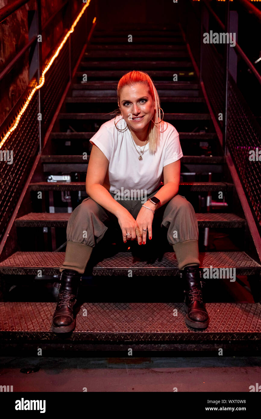 Berlin, Germany. 17th Sep, 2019. Jeanette Biedermann is sitting on a  staircase at the Kulturbrauerei in the Kesselhaus after a concert to  present her new album "DNA". The album "DNA" will be