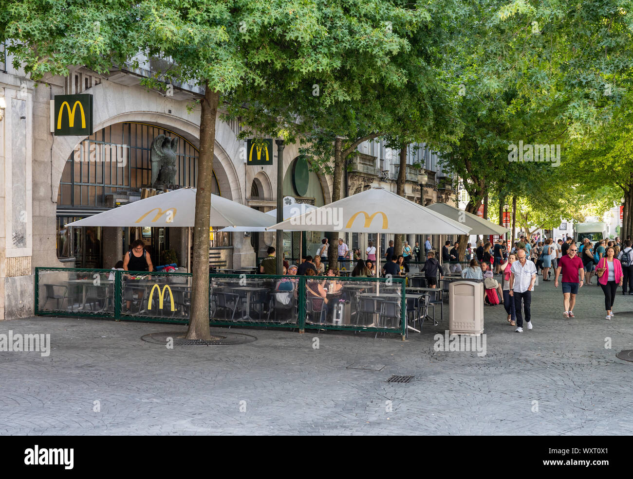 Upmarket outdoor seating and tables at McDonalds in Porto Stock Photo