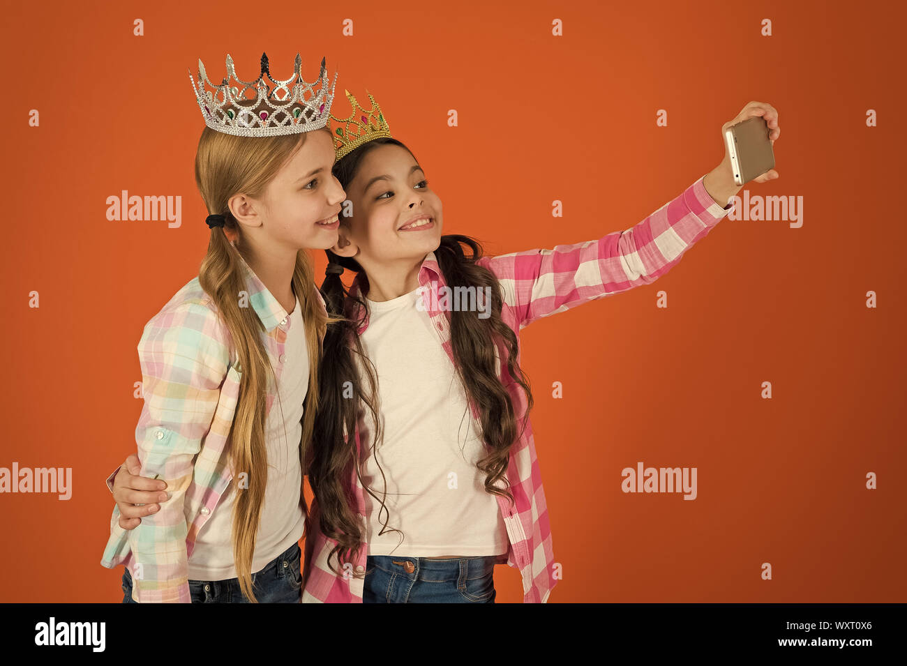 Kids wear golden crowns symbol princess. Warning signs of spoiled child. Avoid raising spoiled