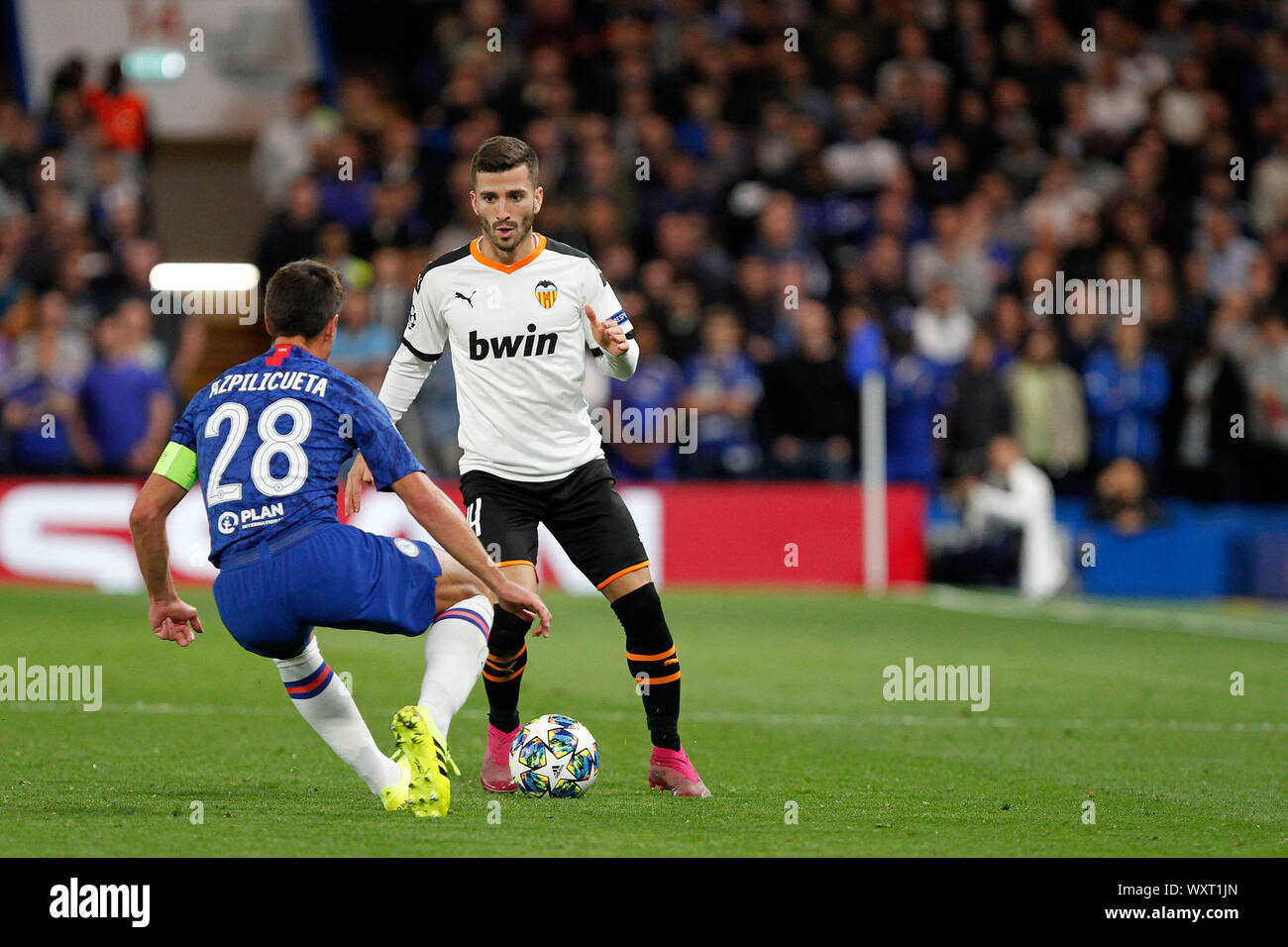 London, UK. 17th Sep, 2019. Csar Azpilicueta of Chelsea faces up Ezequiel Garay of Valencia during the UEFA Champions League group stage match between Chelsea and Valencia at Stamford Bridge, London, England on 17 September 2019. Photo by Carlton Myrie. Editorial use only, license required for commercial use. No use in betting, games or a single club/league/player publications. Credit: UK Sports Pics Ltd/Alamy Live News Stock Photo