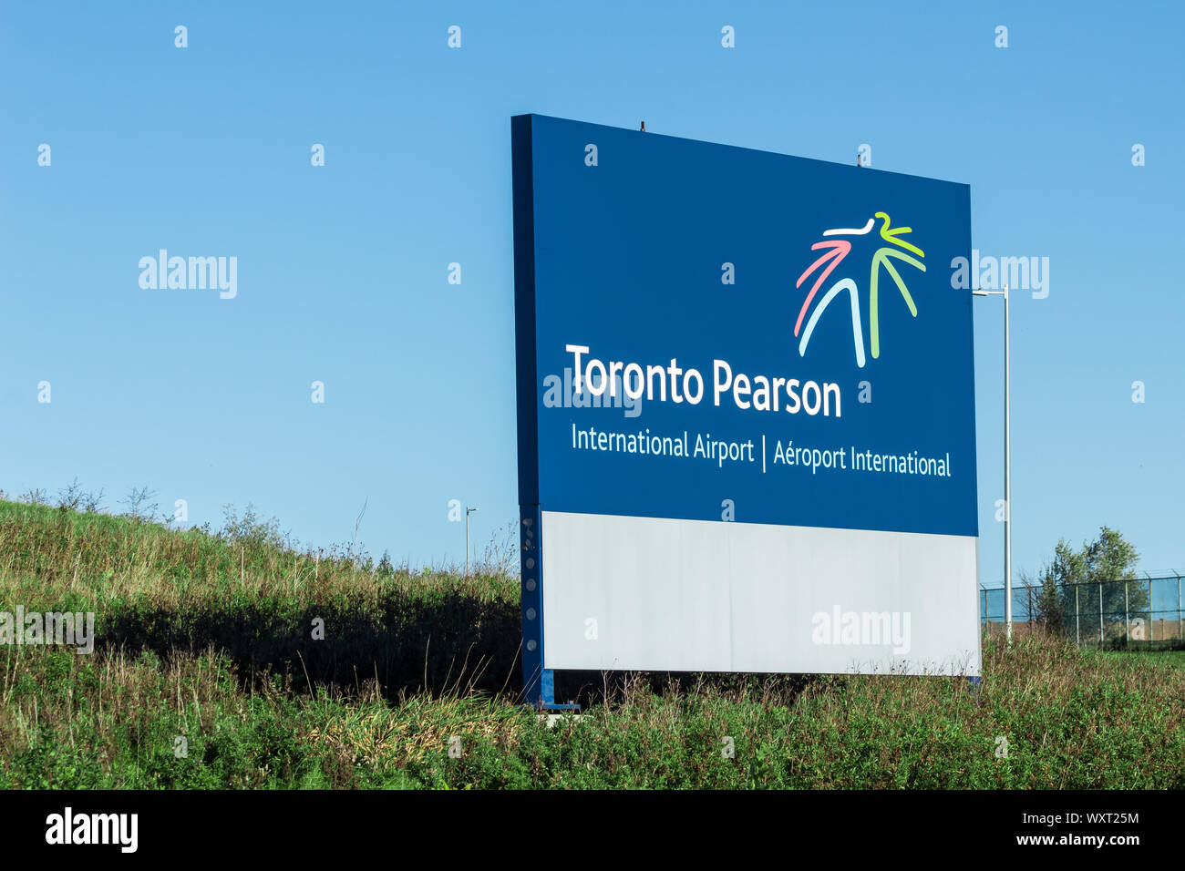 Toronto Pearson International Airport sign on clear day, outside the in-field terminal. Stock Photo