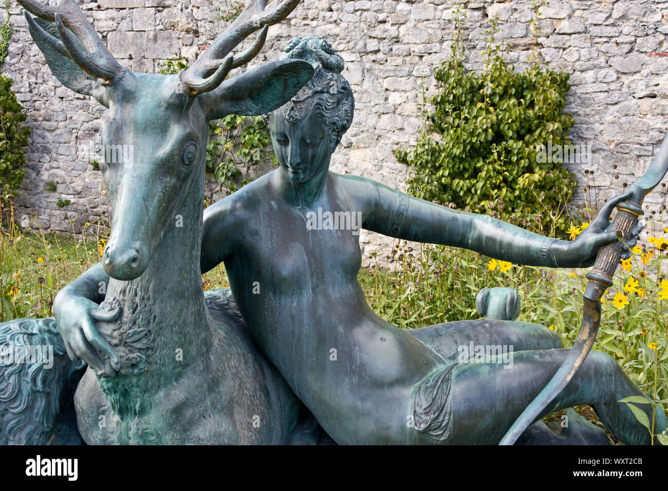 Statue of Diane (Roman goddess of the hunt) and deer at Musee de la Venerie, Place du Parvis Notre Dame, Senlis, France Stock Photo