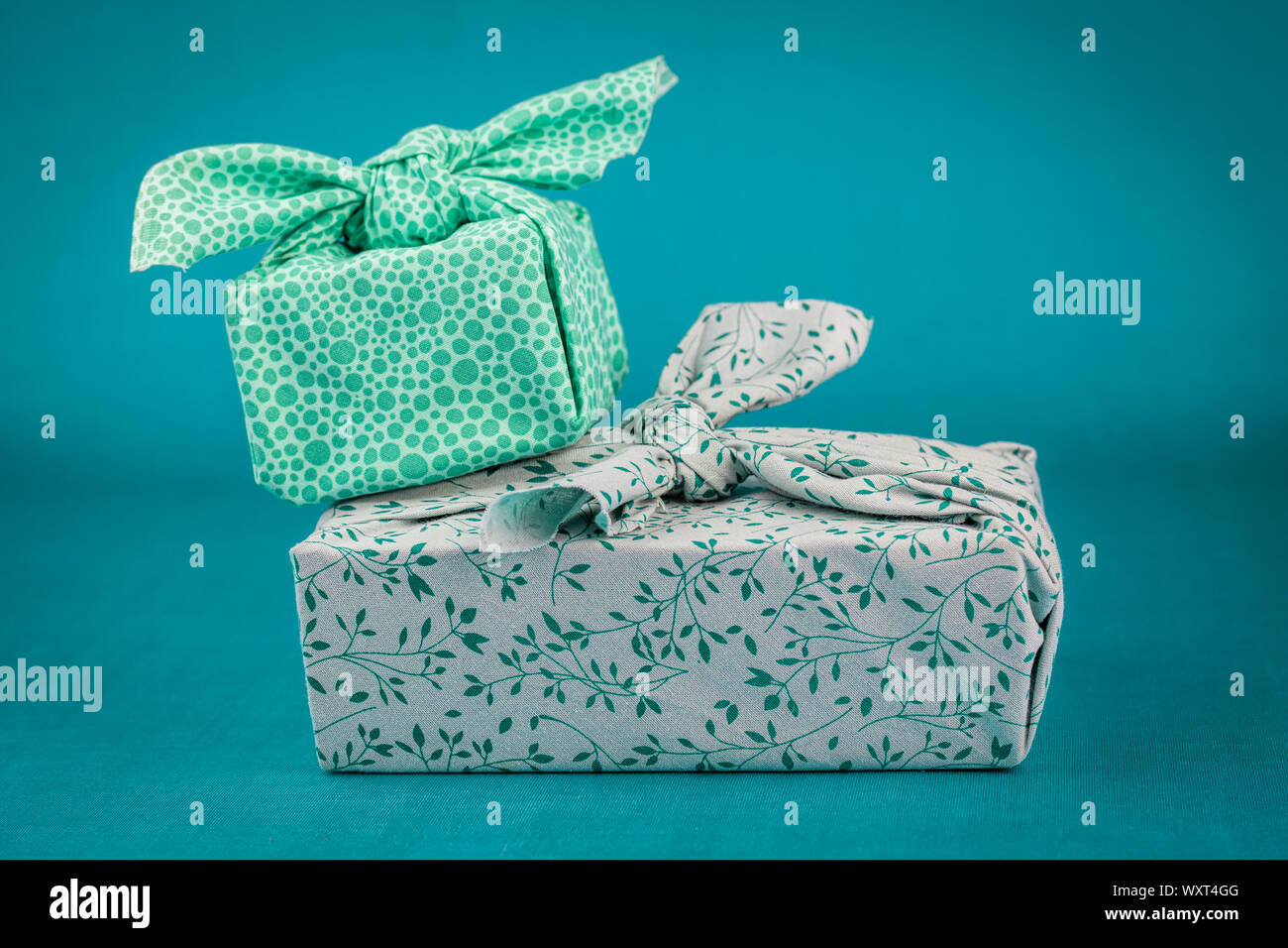 Fabric wrapped gifts, reusable sustainable recycled textile gift