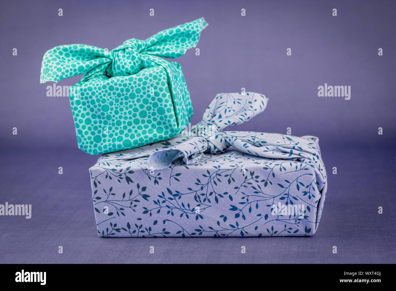 Fabric wrapped gifts, reusable sustainable recycled textile gift