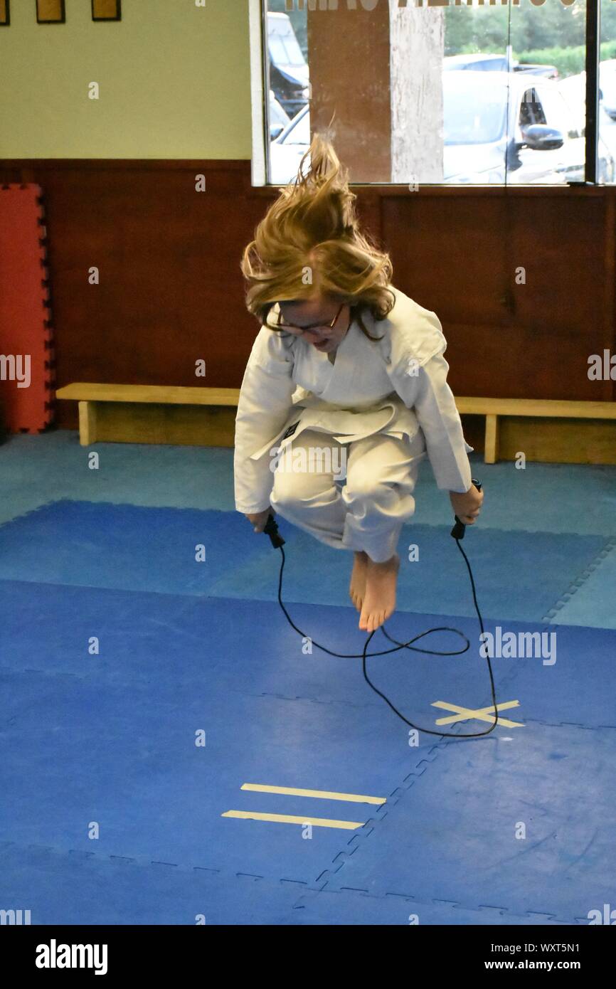 This action photo is of my daughter in her Karate class. Karate is a ...