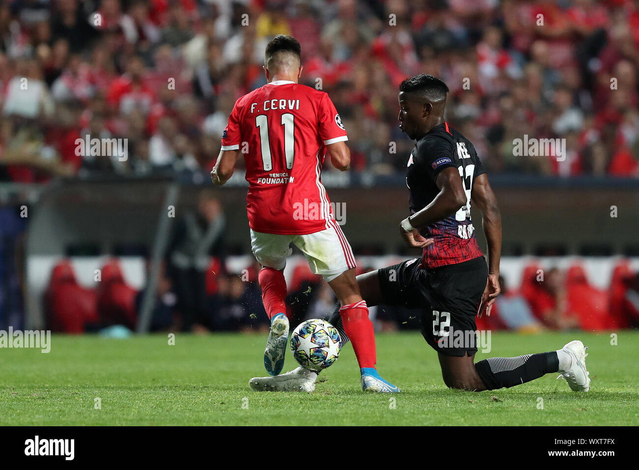 Lisbon. 17th Sep, 2019. Nordi Mukiele (R) of RB Leipzig vies with Franco Cervi of SL Benfica during the UEFA Champions League Group G football match in Lisbon, Portugal on Sept. 17, 2019. Credit: Pedro Fiuza/Xinhua Stock Photo