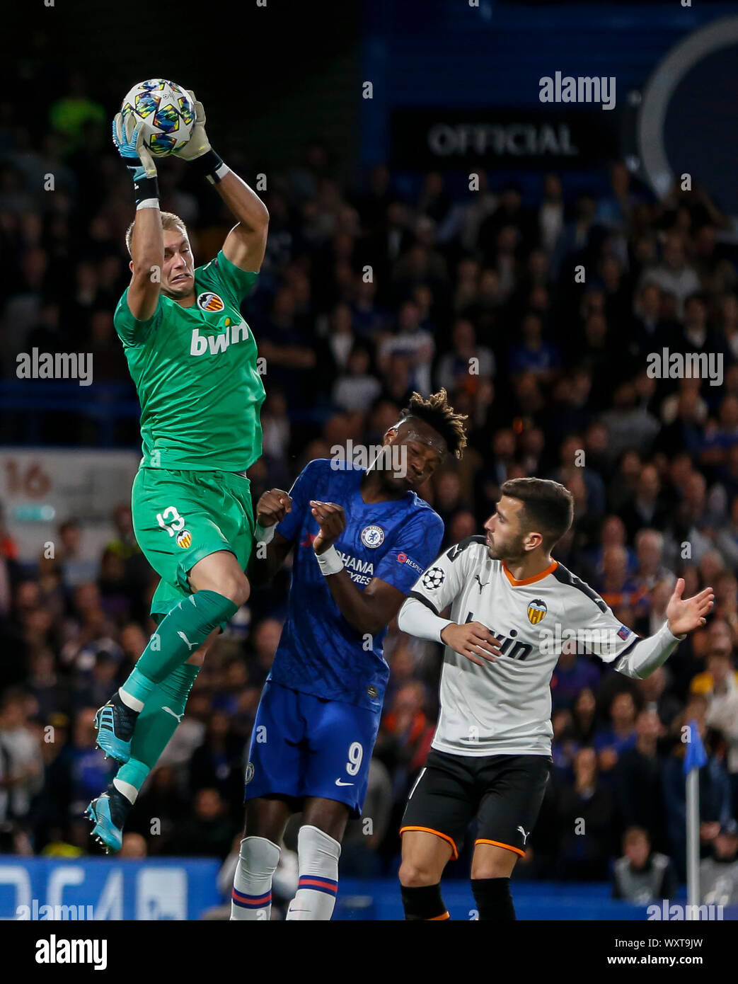 London, UK. 17th Sep, 2019. Valencia's goalkeeper Jasper Cillessen (L) saves the ball during the UEFA Champions League Group H match between Chelsea and Valencia at Stamford Bridge Stadium in London, Britain on Sept. 17, 2019. Chelsea lost 0-1. Credit: Han Yan/Xinhua/Alamy Live News Stock Photo