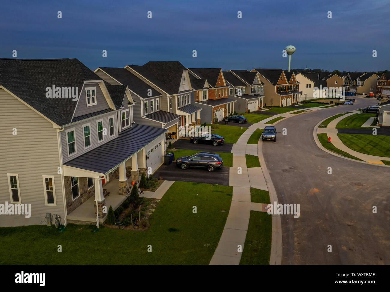 Aerial view of typical American new construction neighborhood street in
