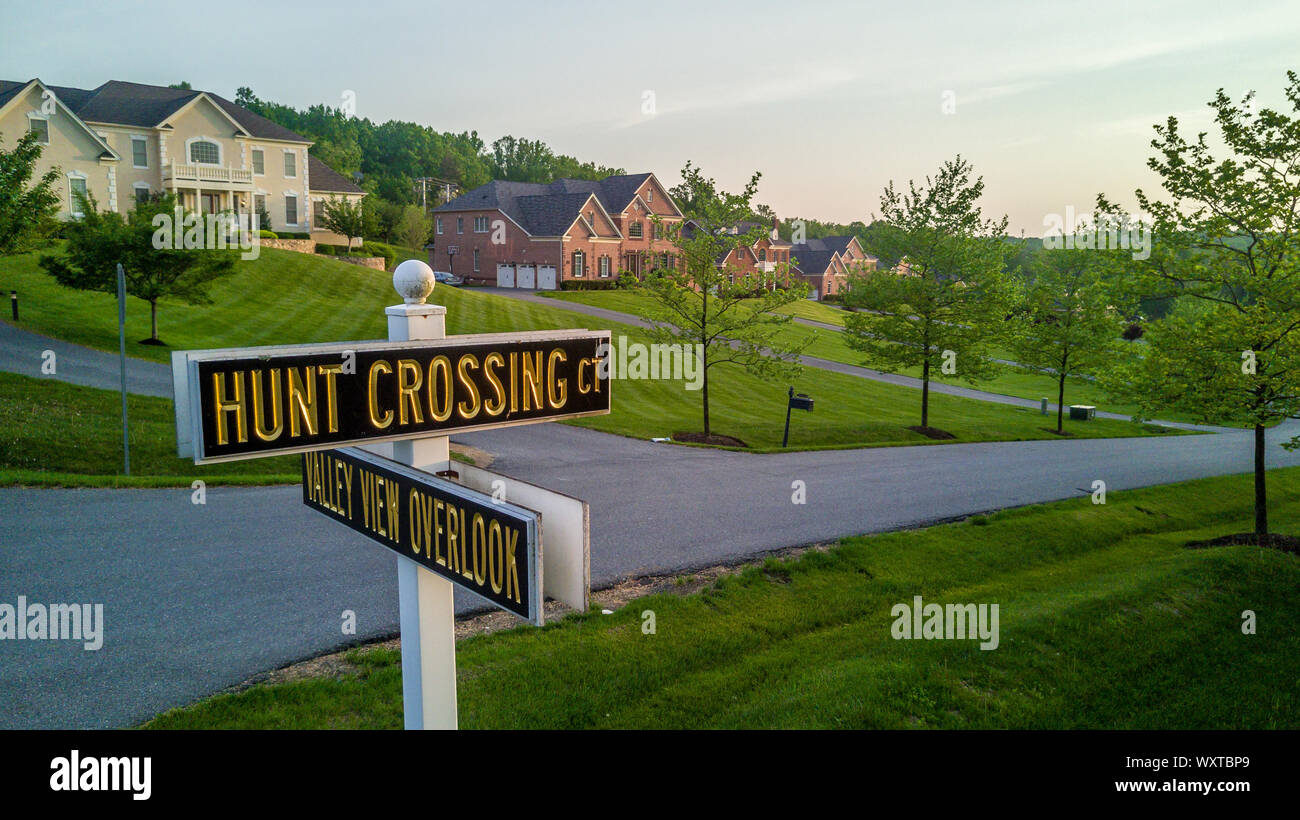 View of street signs with golden letters at a luxury real estate development in Maryland USA Stock Photo