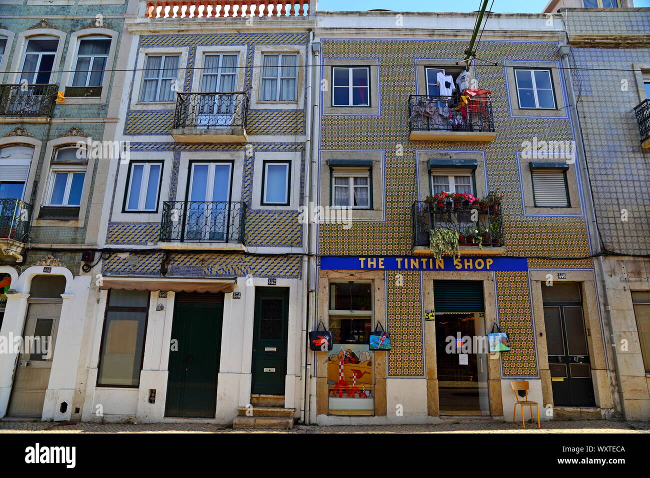 Traditional colorful buildings with azulejo tiles facade in the old Lisbon neighborhoods Portugal Stock Photo