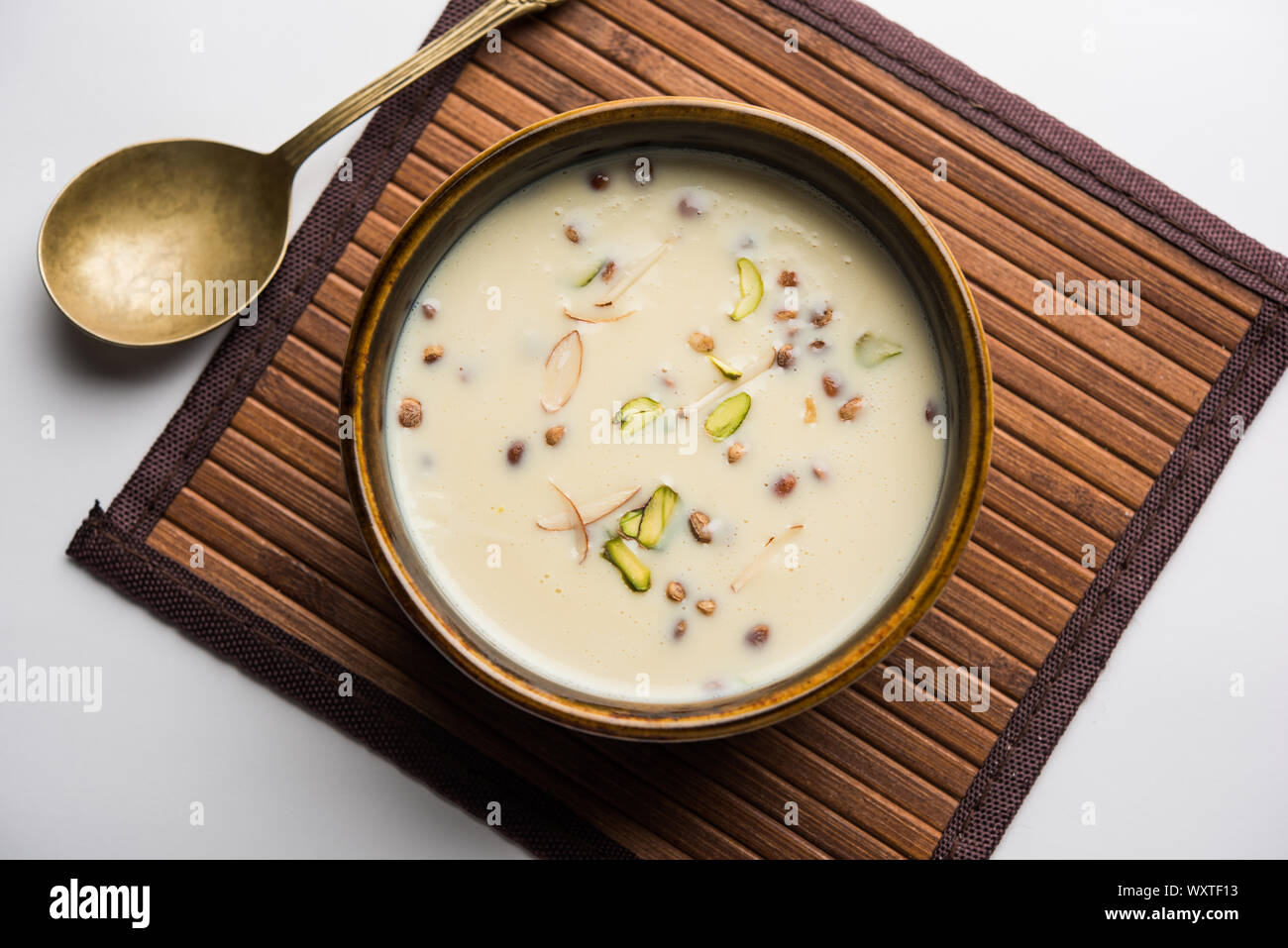 Fruit Rabedi Basundi / Rabri or Rabdi - is a dessert made of condensed milk and dry ...