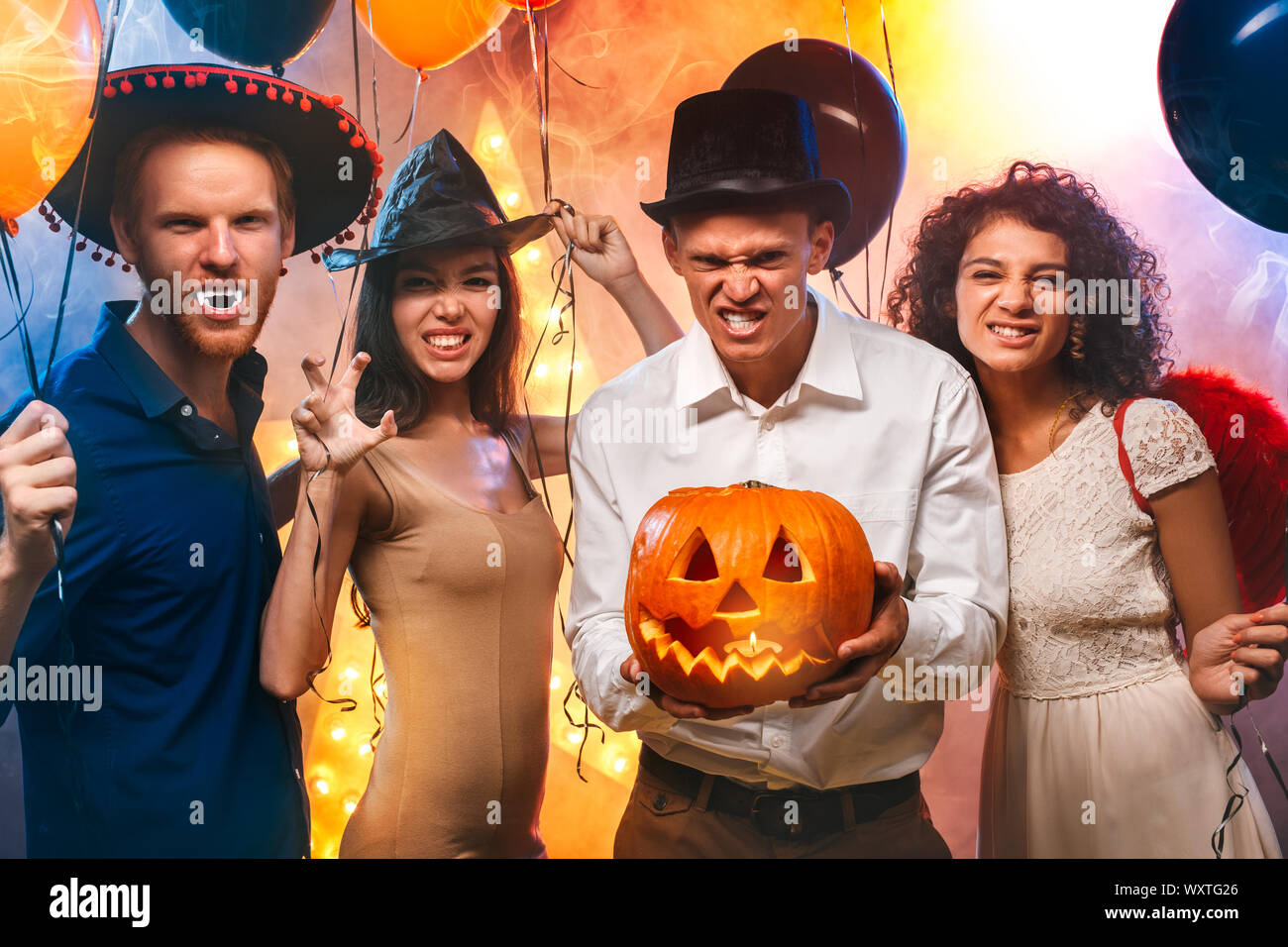 Colleagues wearing party hats hi-res stock photography and images - Alamy