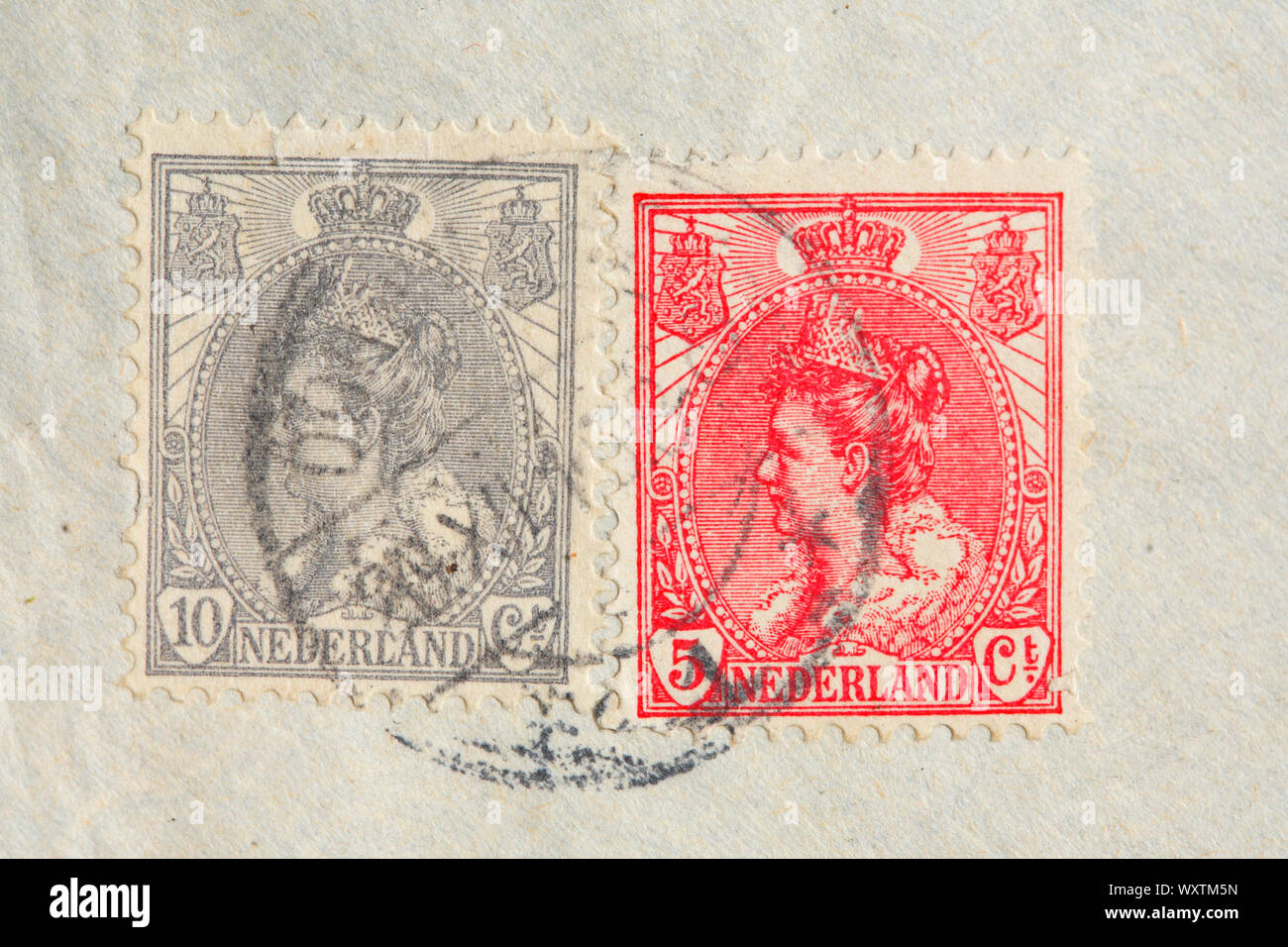 Old stamped Dutch postage stamps with Queen Wilelmina from 1899, Netherlands Stock Photo