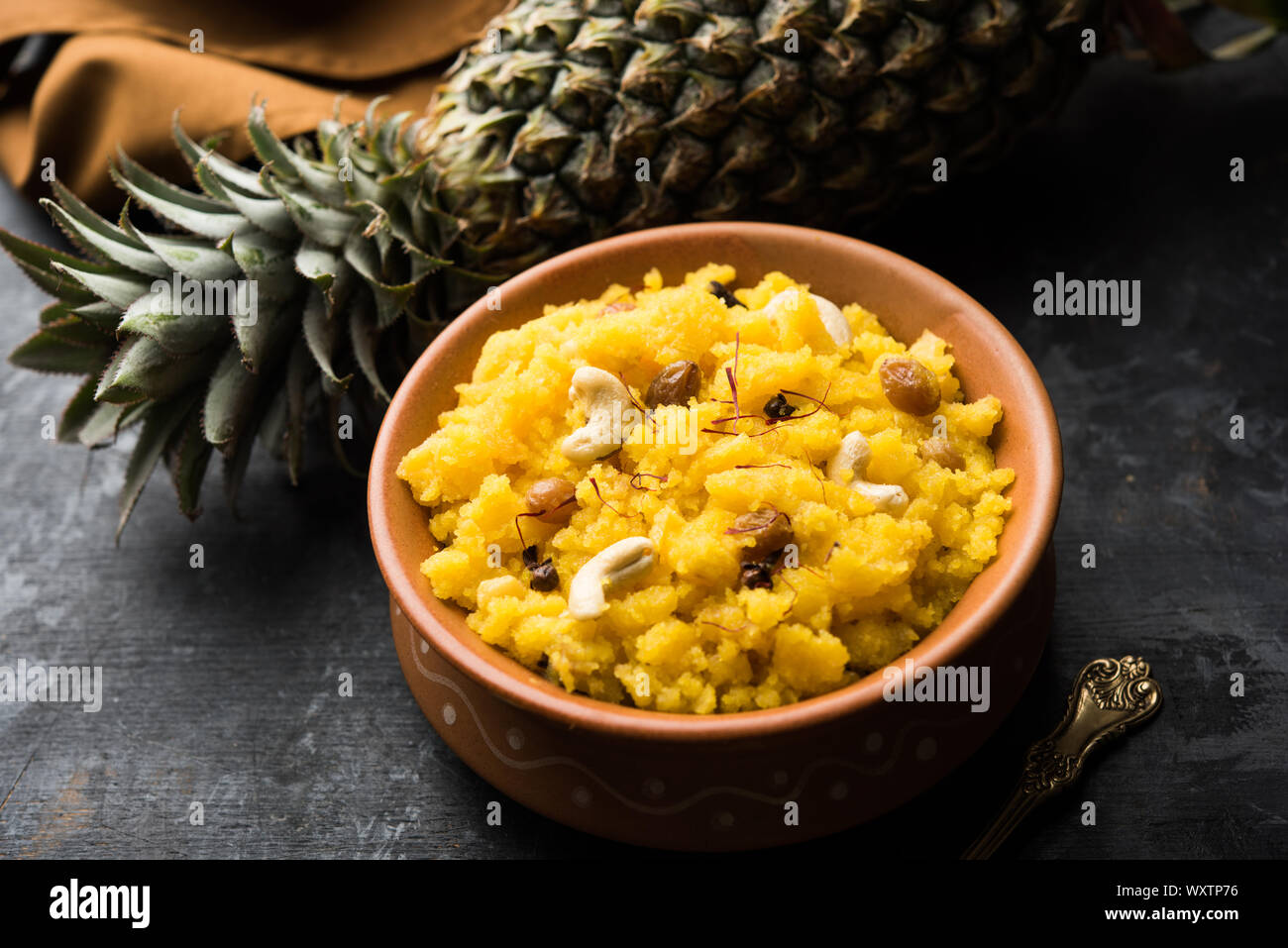 Pineapple sheera or Halwa also known as Ananas keshri shira. Popular
