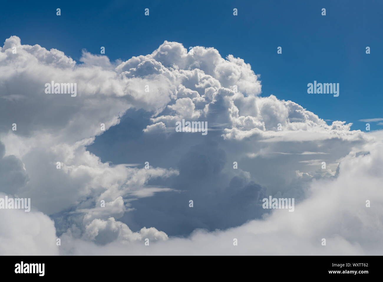 Cumulonimbus clouds formation looking from airplane window Stock Photo ...