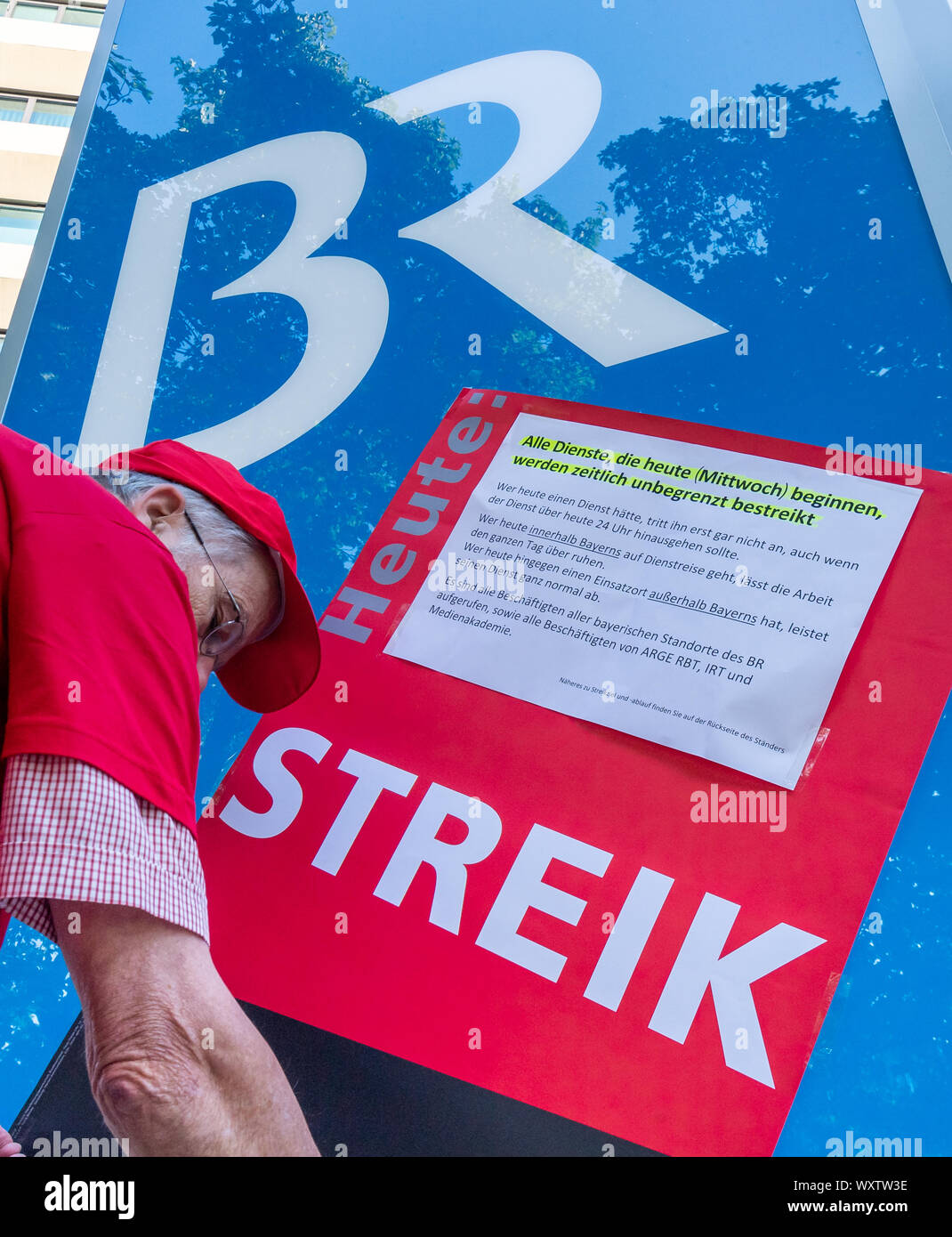 Munich, Germany. 18th Sep, 2019. A poster with the inscription "Strike" is  hung up in front of the Bavarian radio station's broadcasting center. For  the first time, the Bayerischer Rundfunk (BR) has