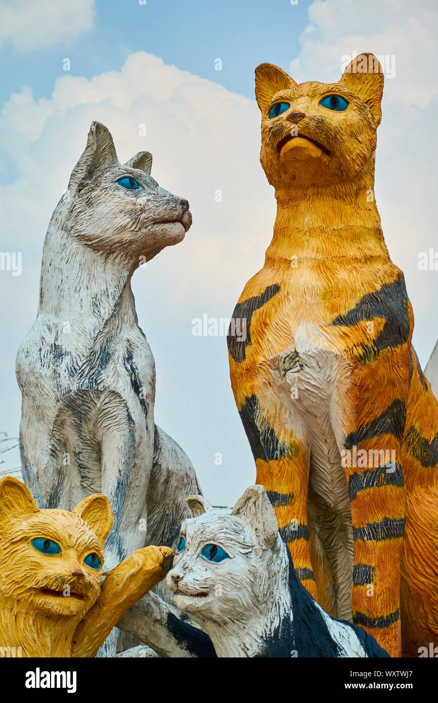 A statue of a group of cats, the symbol of Kuching (cat in Malay), in