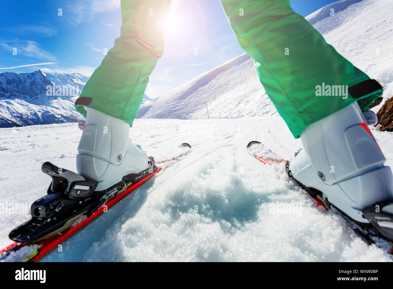 Ski closeup of a boy go downhill on mountain slope Stock Photo - Alamy