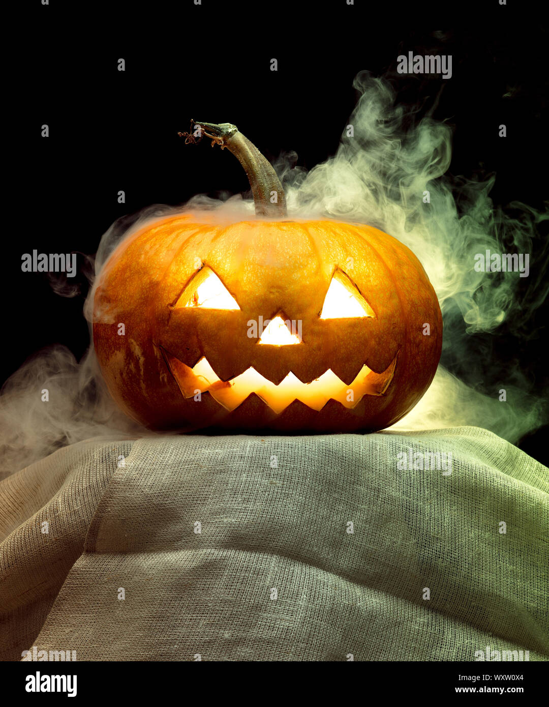 Halloween pumpkin head jack-o-lantern with scary evil face. Seasonal ...